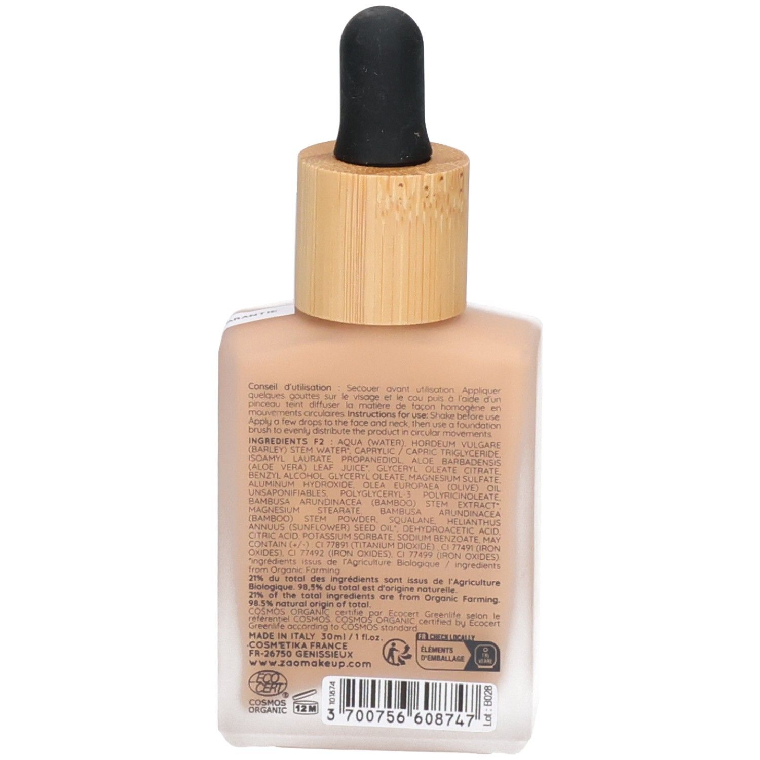 Dos du flacon de sérum teinté. Inscriptions : ingrédients, mode d'emploi. Certification bio. Fabriqué en Italie.