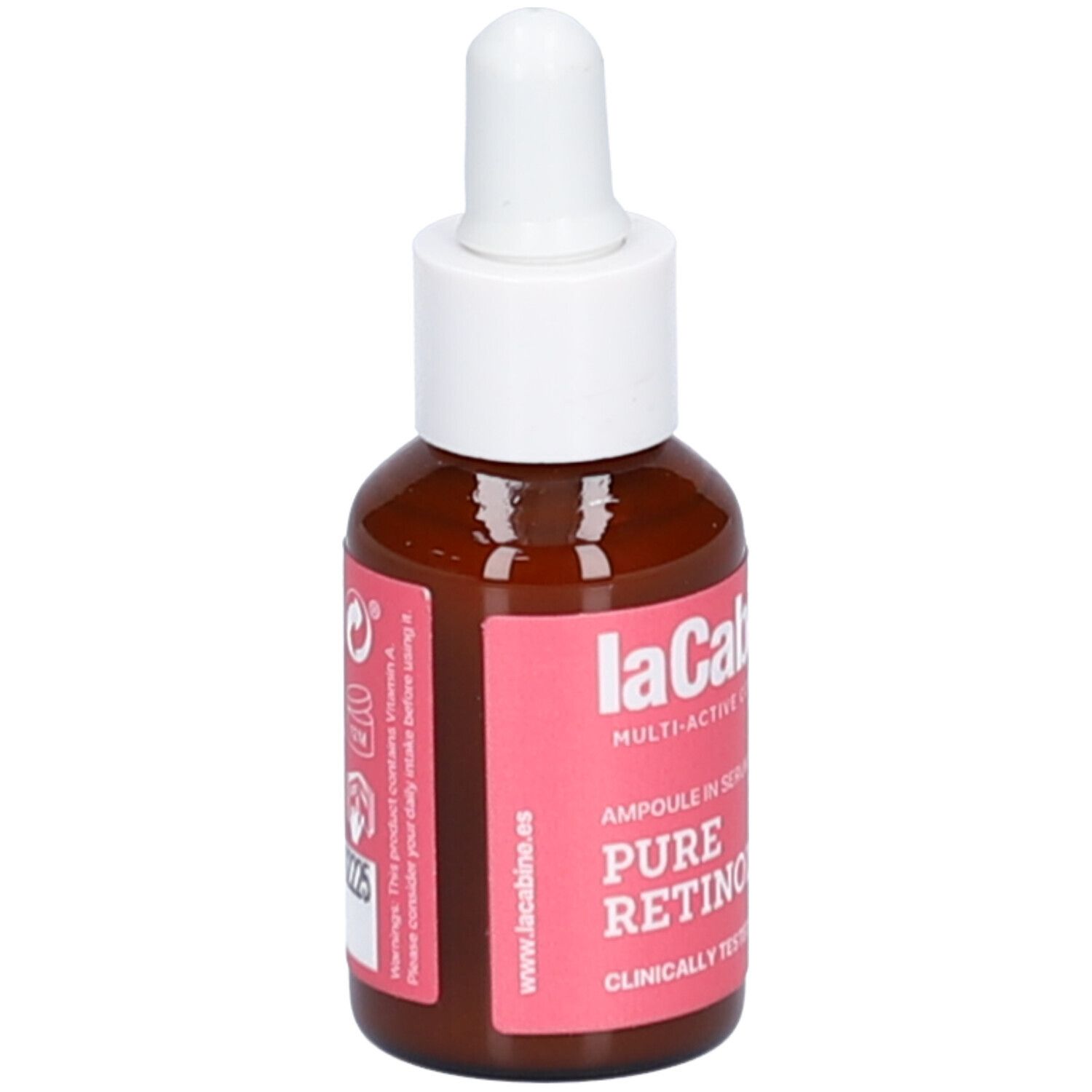 Flacon brun avec compte-gouttes blanc. Étiquette rose avec texte: Pure Retinol. Marque: laCabine. Contient des avertissements.