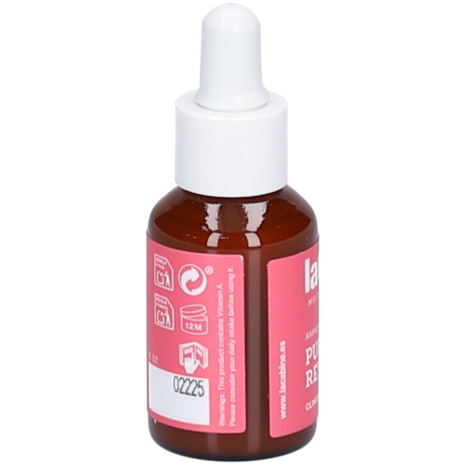 Flacon brun avec compte-gouttes blanc. Étiquette rose avec texte: Pure Retinol. Marque: laCabine. Contient des avertissements.