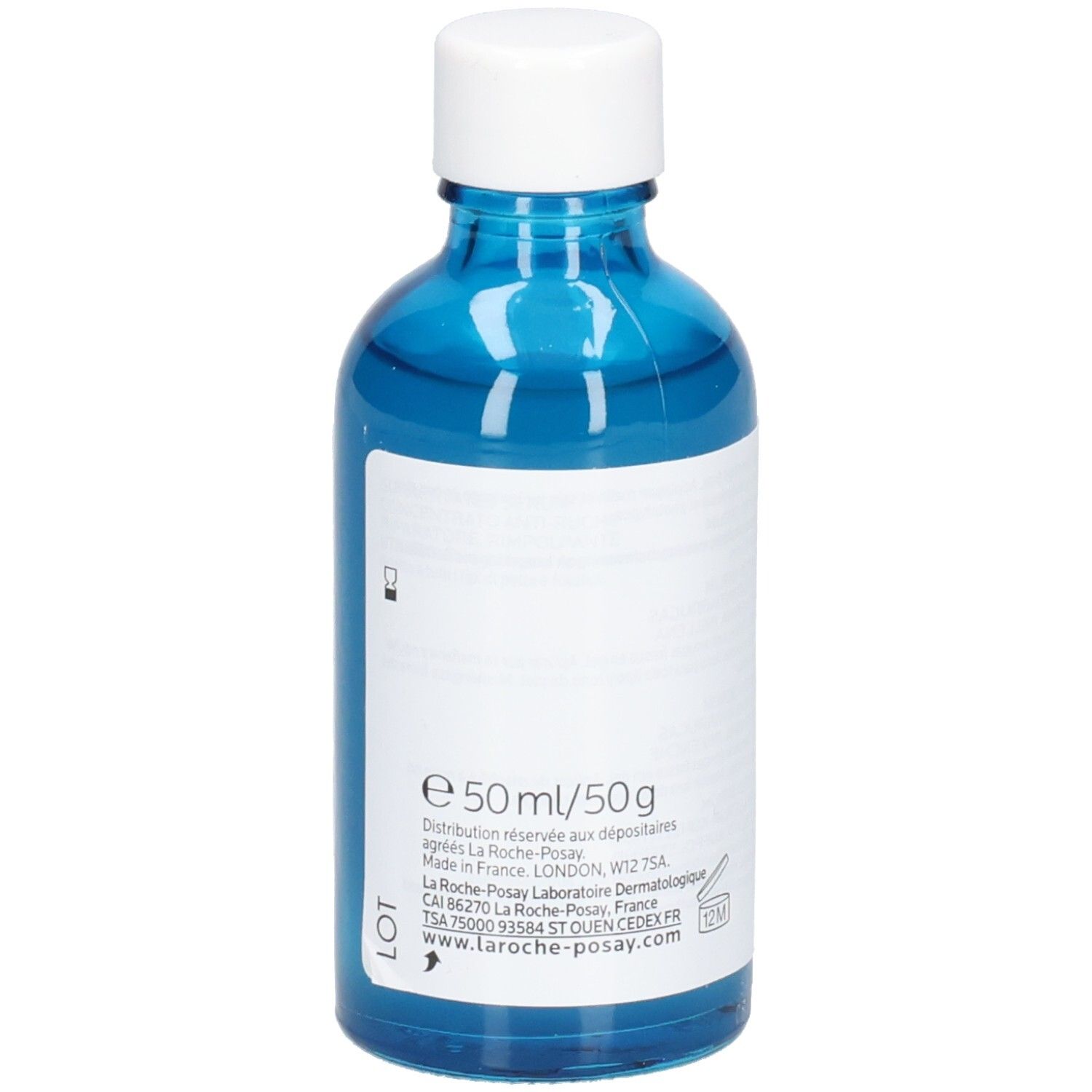 Flacon en verre bleu avec bouchon blanc. Dos avec étiquette. Imprimé: e 50 ml/50g, informations de fabrication.