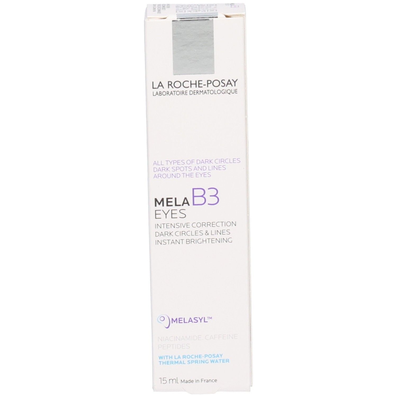 Emballage blanc. Inscriptions: La Roche-Posay, Mela B3 Yeux. Corrige cernes, taches pigmentaires.