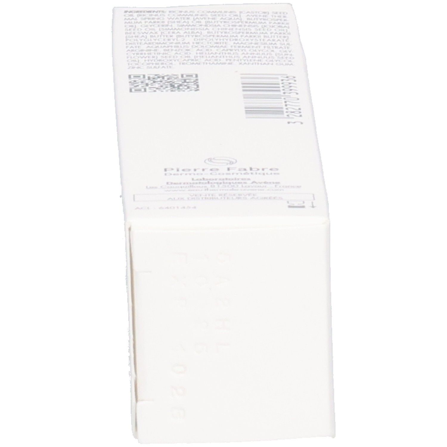 Vue latérale de l'emballage blanc. Texte et code-barres.