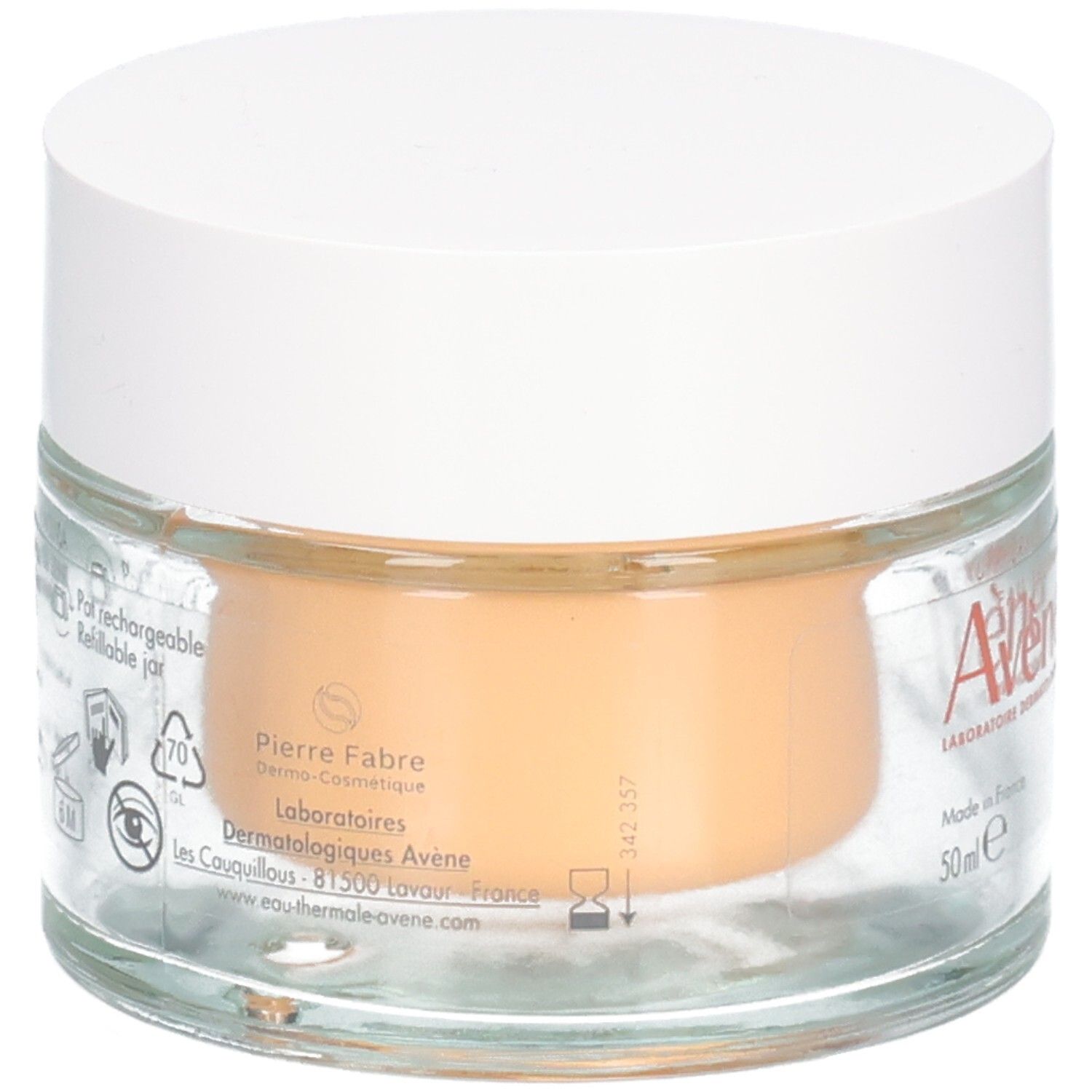 Pot en verre avec couvercle blanc. Inscription: Pierre Fabre. Dos avec informations et symboles. Contenu orangé.