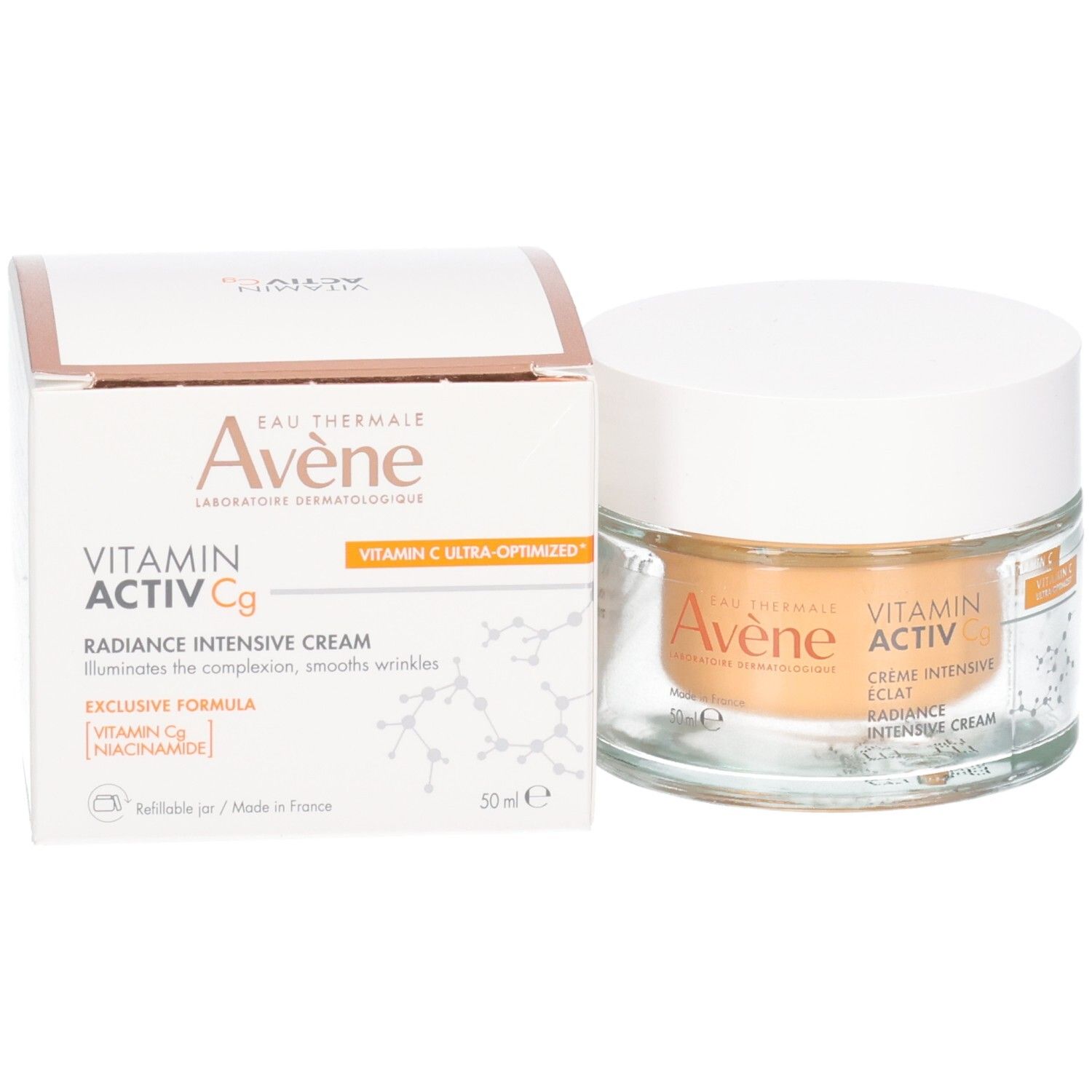 Emballage du produit et pot en verre. Inscription: Avene, Vitamin Activ Cg, Radiance Intensive Cream. Contenu orangé.