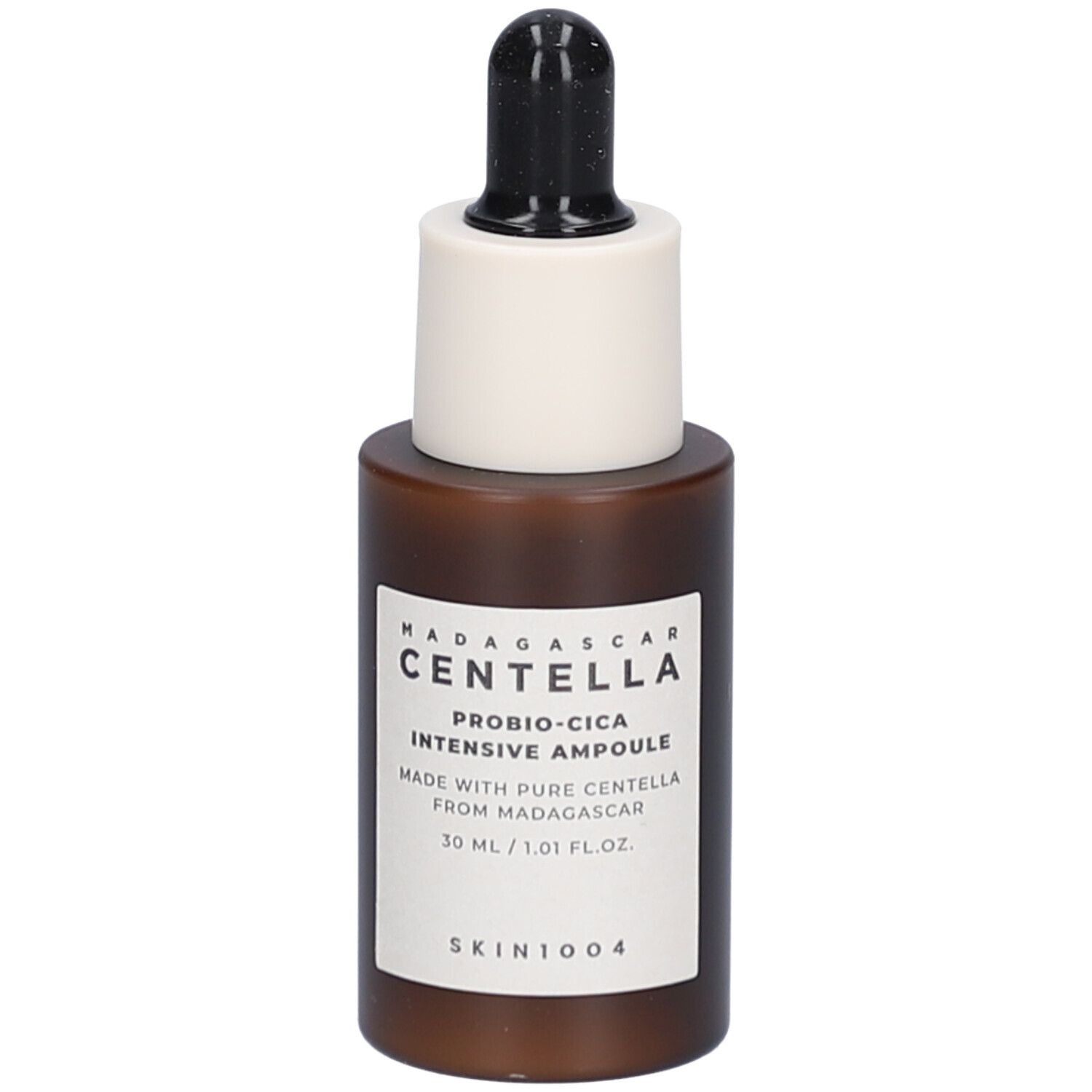 Flacon de sérum brun avec bouchon noir et embout blanc. Étiquette avec texte.