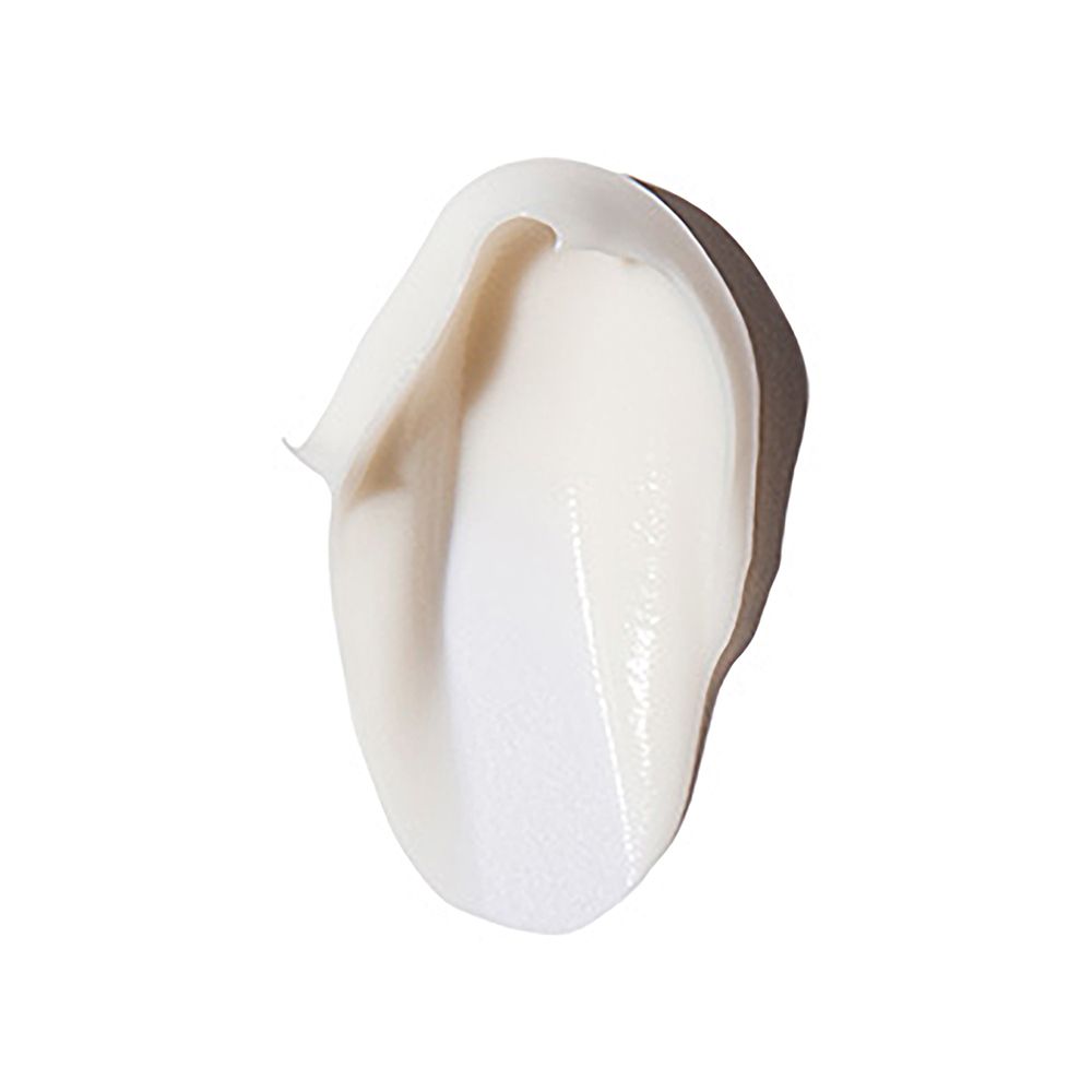 Échantillon de crème blanche. Texture lisse. Sur fond clair.