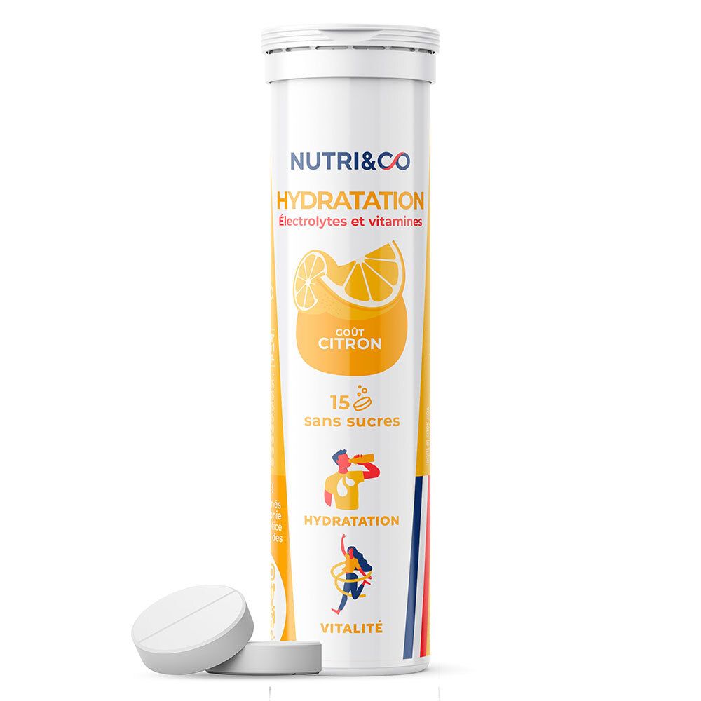 Tube cylindrique avec comprimés. Inscription: NUTRI & CO HYDRATATION, citron, 15 sans sucres. Deux comprimés à côté.