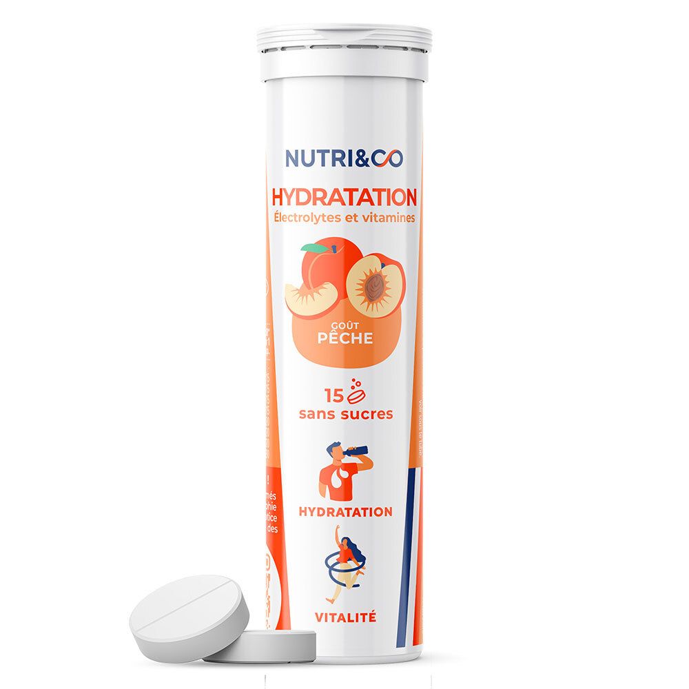 Tube NUTRI & CO Hydratation, goût pêche, 15 comprimés. Deux comprimés blancs sont visibles à côté.