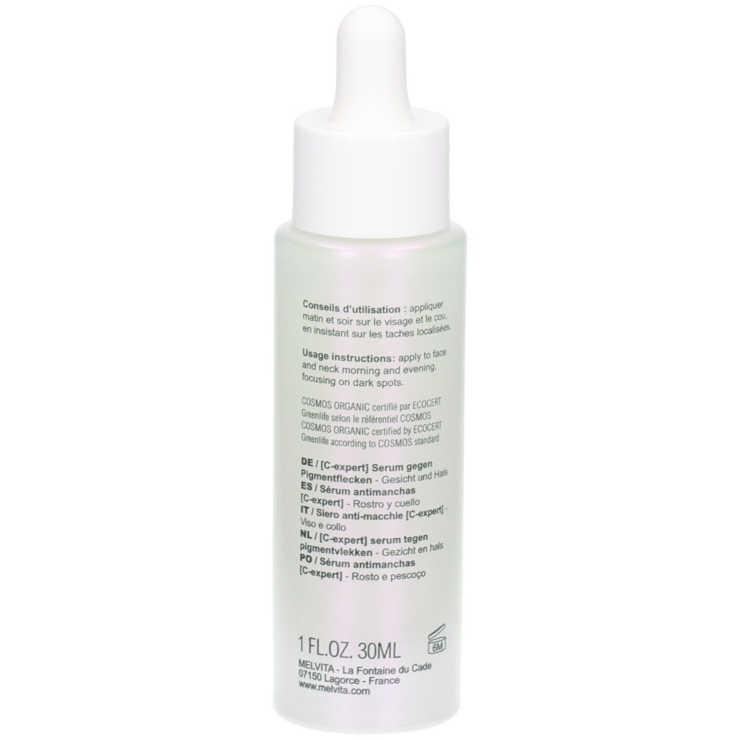 Flacon de sérum, dos avec texte. Inscriptions: Nectar de Lumière, Sérum anti-taches, C-expert, Brightening serum, C-expert. Texte multilingue.