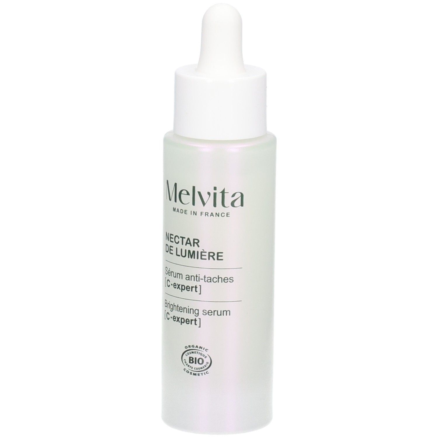 Flacon de sérum avec pipette. Inscriptions: Melvita, Nectar de Lumière, Sérum anti-taches, C-expert, Brightening serum, C-expert.