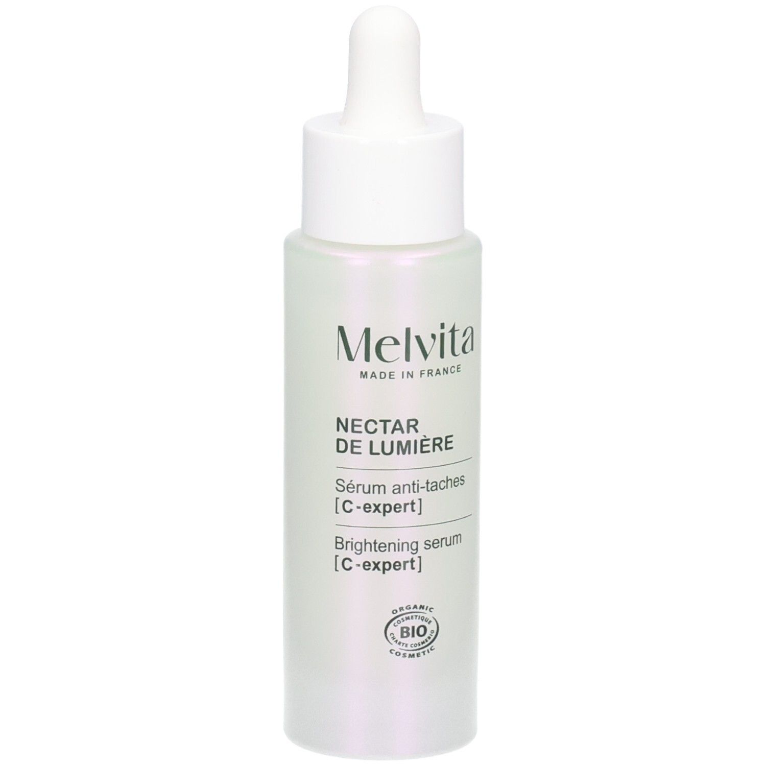 Flacon de sérum avec pipette. Inscriptions: Melvita, Nectar de Lumière, Sérum anti-taches, C-expert, Brightening serum, C-expert.