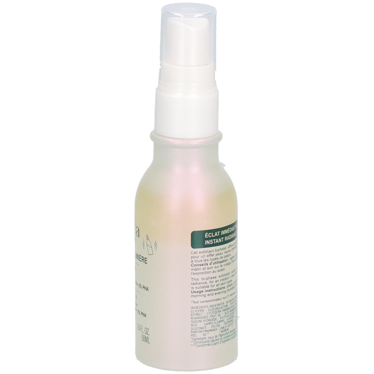 Flacon, vue arrière oblique. Inscription: Eclat immédiat, Instant radiance. Texte sur l'utilisation. Certification COSMOS ORGANIC.