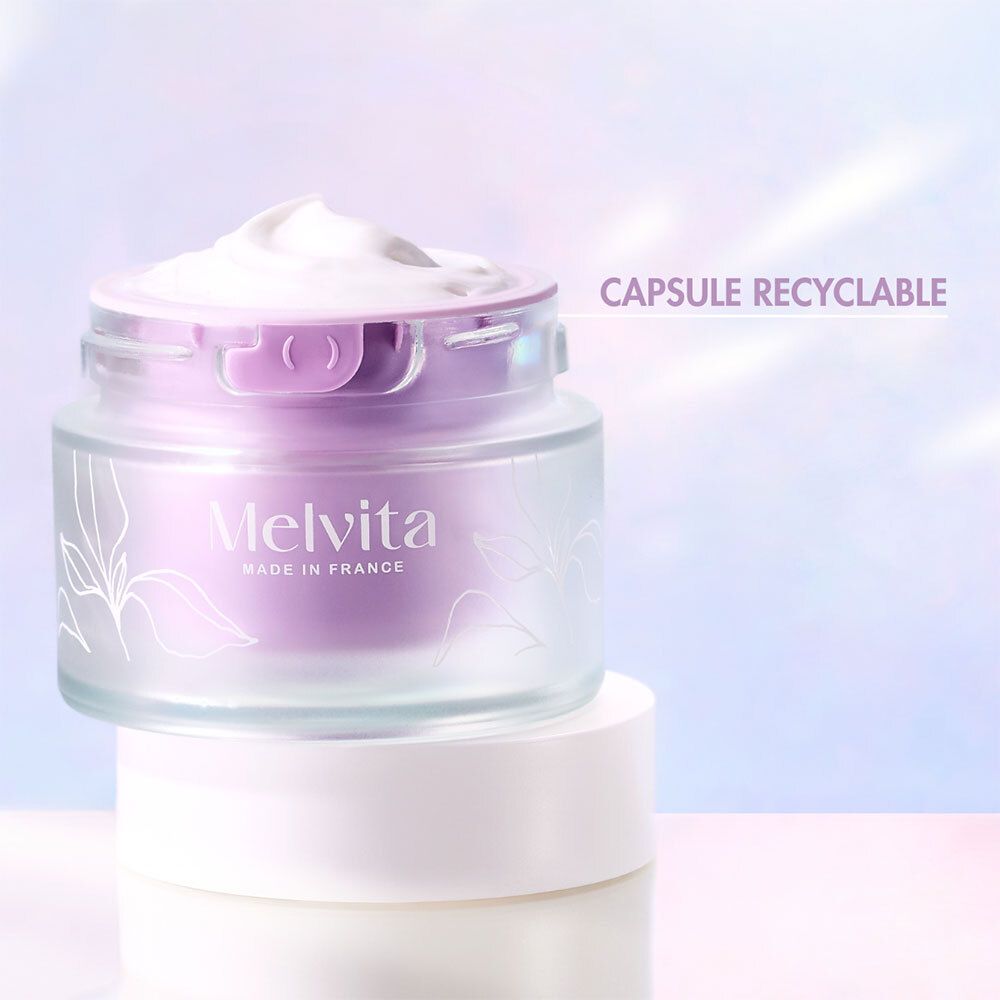 Pot de crème avec couvercle. Texte : Capsule recyclable. Melvita.