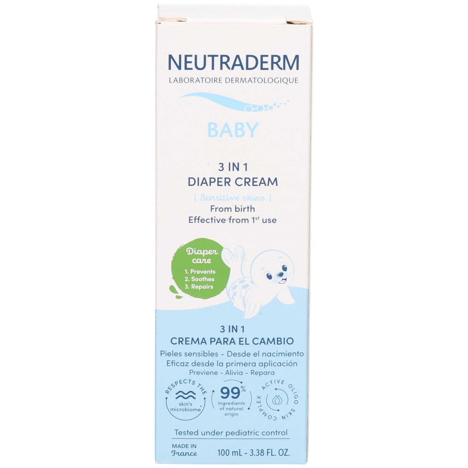 Face avant de la boîte pliante pour crème de change Neutraderm Baby 3-en-1. Montre une illustration de phoque et les noms du produit en espagnol et anglais.