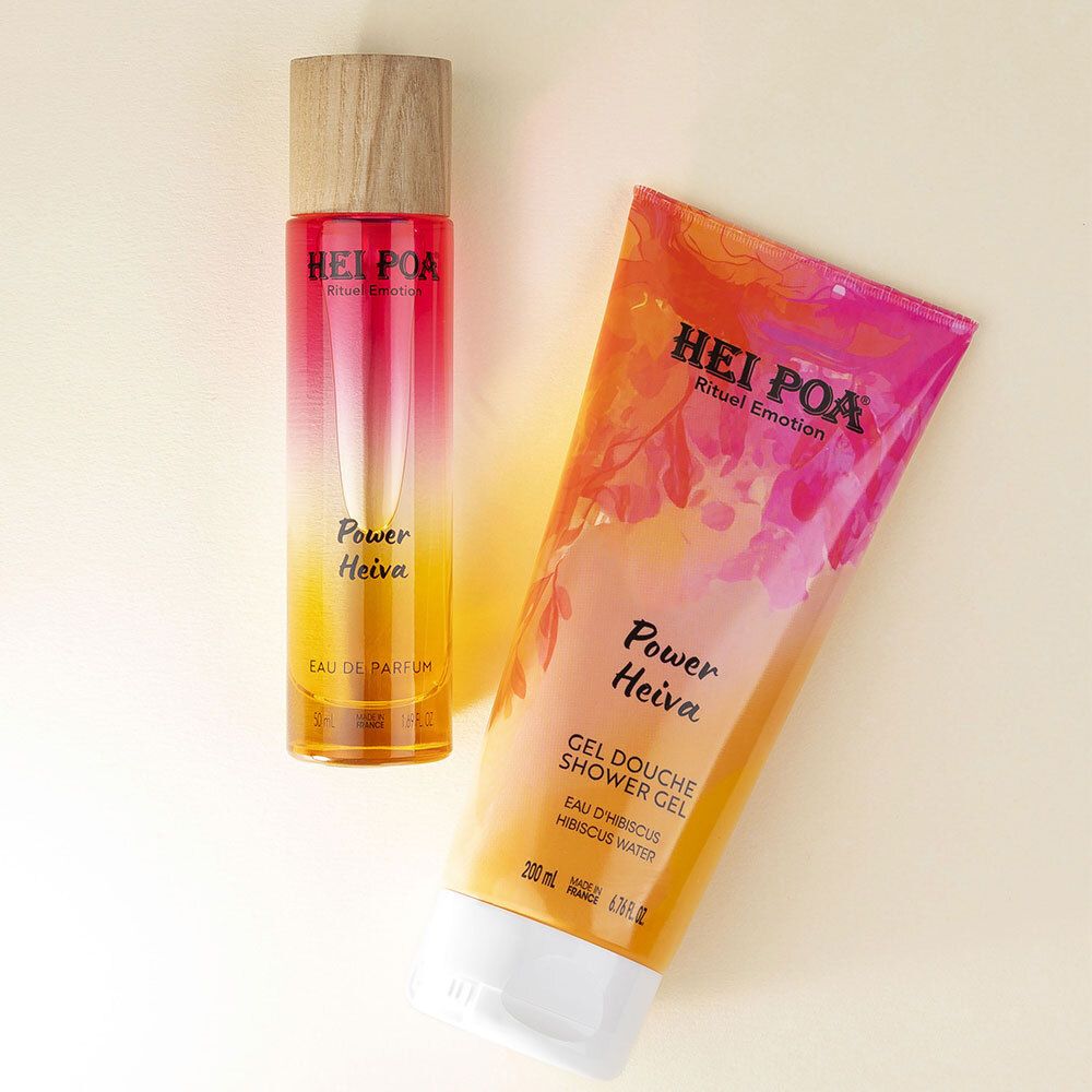 Tube Hei Poa Gel Douche Power Heiva à côté d'une bouteille d'Eau de Parfum.