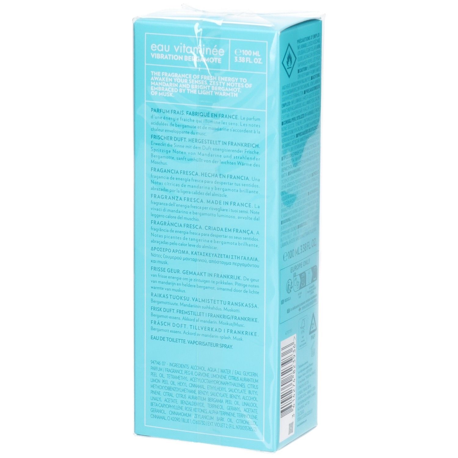 Boîte bleu clair avec texte multilingue. Texte: Eau Vitaminée, Vibration Bergamote, fabriqué en France.