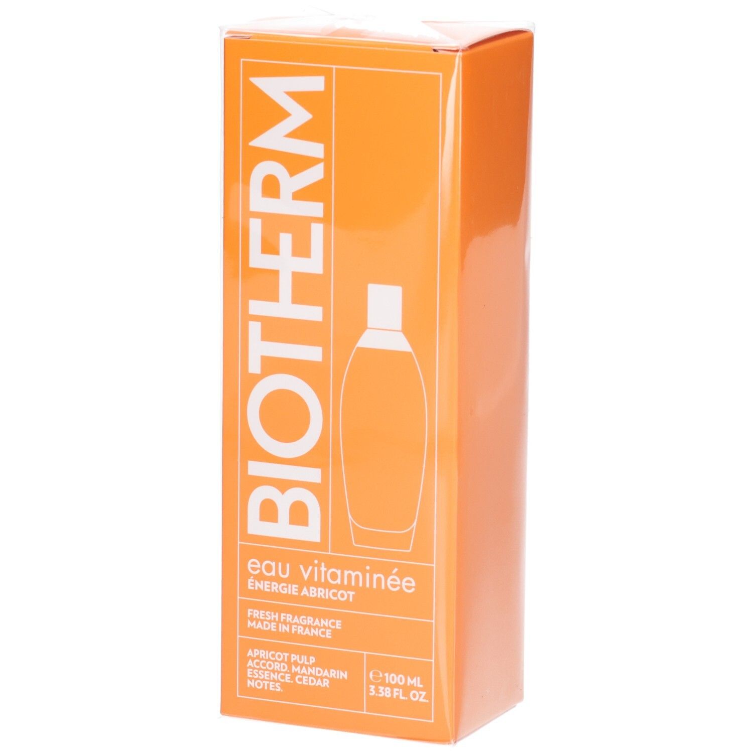 Boîte orange. Inscription: Biotherm, Eau Vitaminée Énergie Abricot. Illustration d'un flacon. 100 ml.