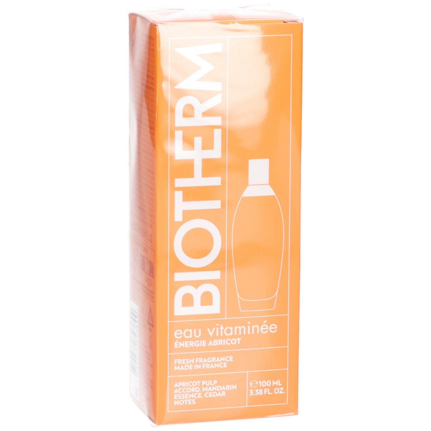 Boîte orange. Inscription: Biotherm, Eau Vitaminée Énergie Abricot. Illustration d'un flacon. 100 ml.