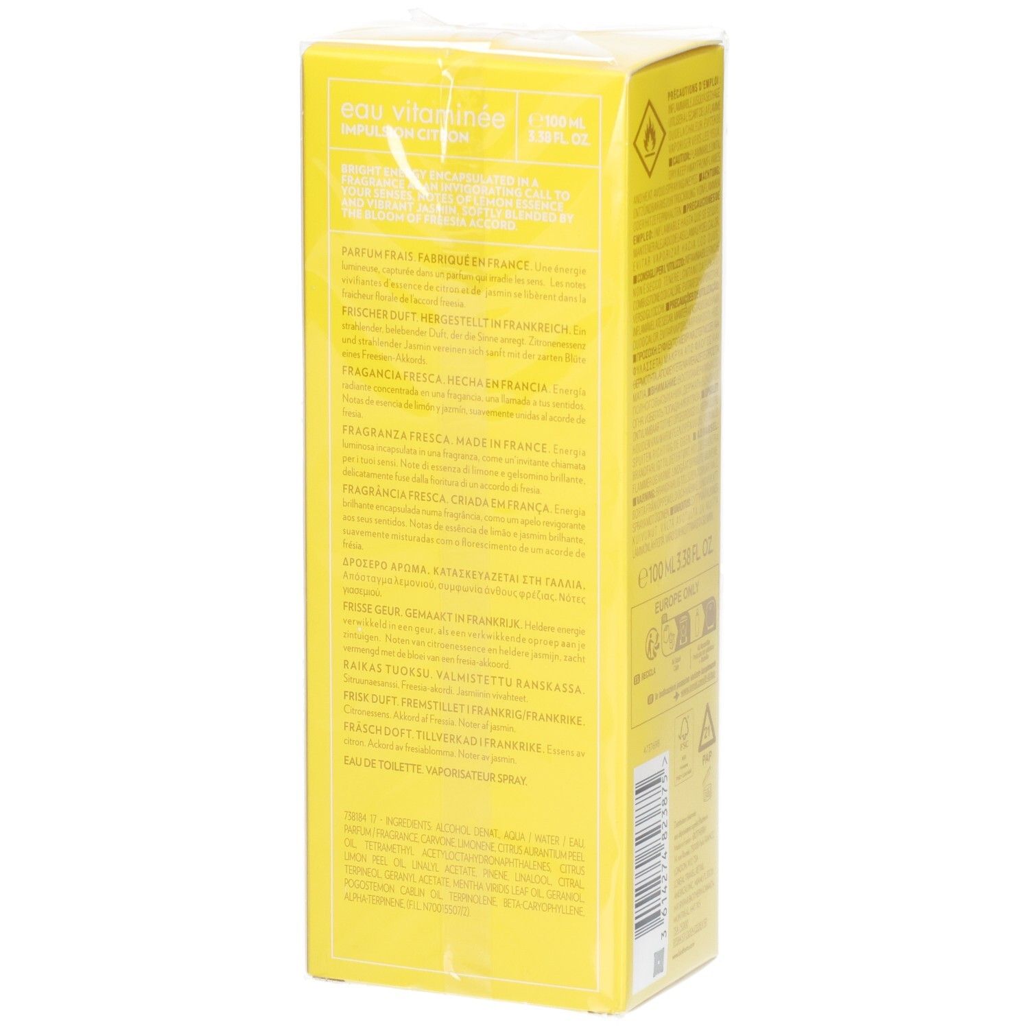 Boîte jaune avec texte. Contient les ingrédients, l'origine et les avertissements. Emballé dans du film transparent.