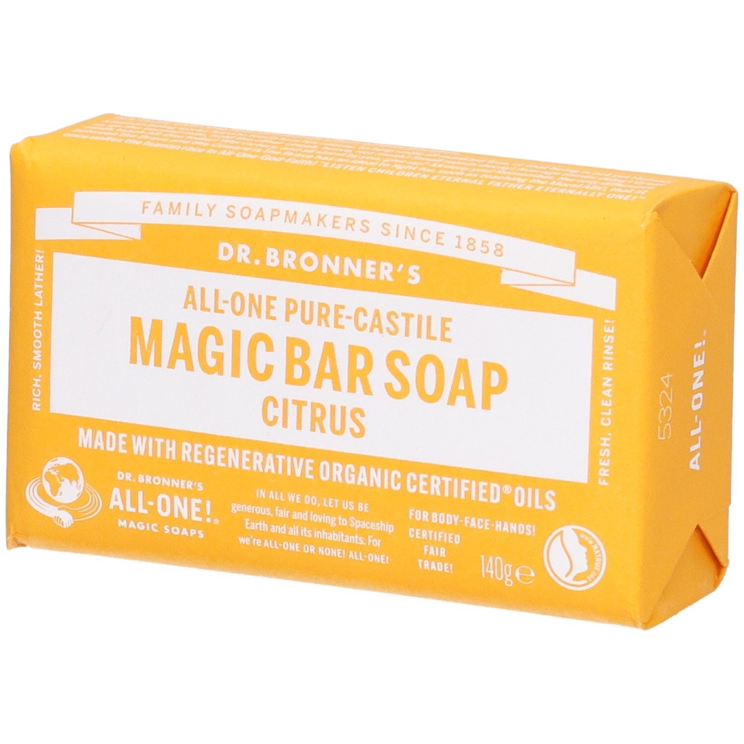 Pain de savon jaune emballé. Inscription: Dr. Bronner's Magic Bar Soap Citrus. Certifications.