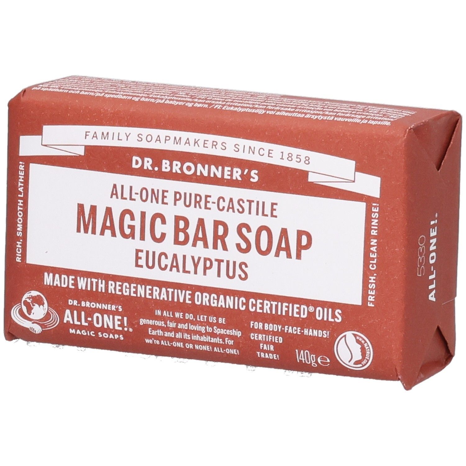 Pain de savon emballé. Inscription: Dr. Bronner's Magic Bar Soap Eucalyptus. Label Fair Trade visible.