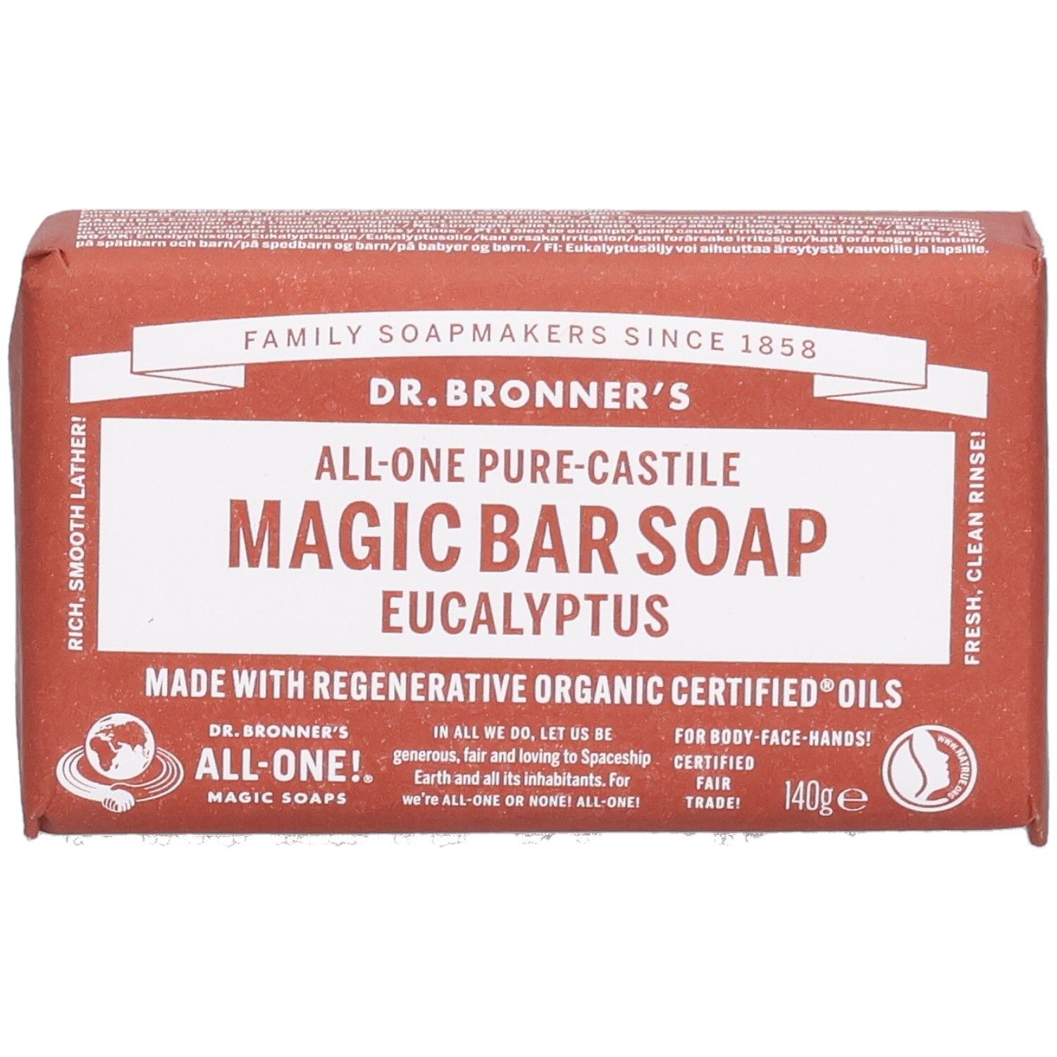 Pain de savon emballé. Inscription: Dr. Bronner's Magic Bar Soap Eucalyptus. Label Fair Trade visible.