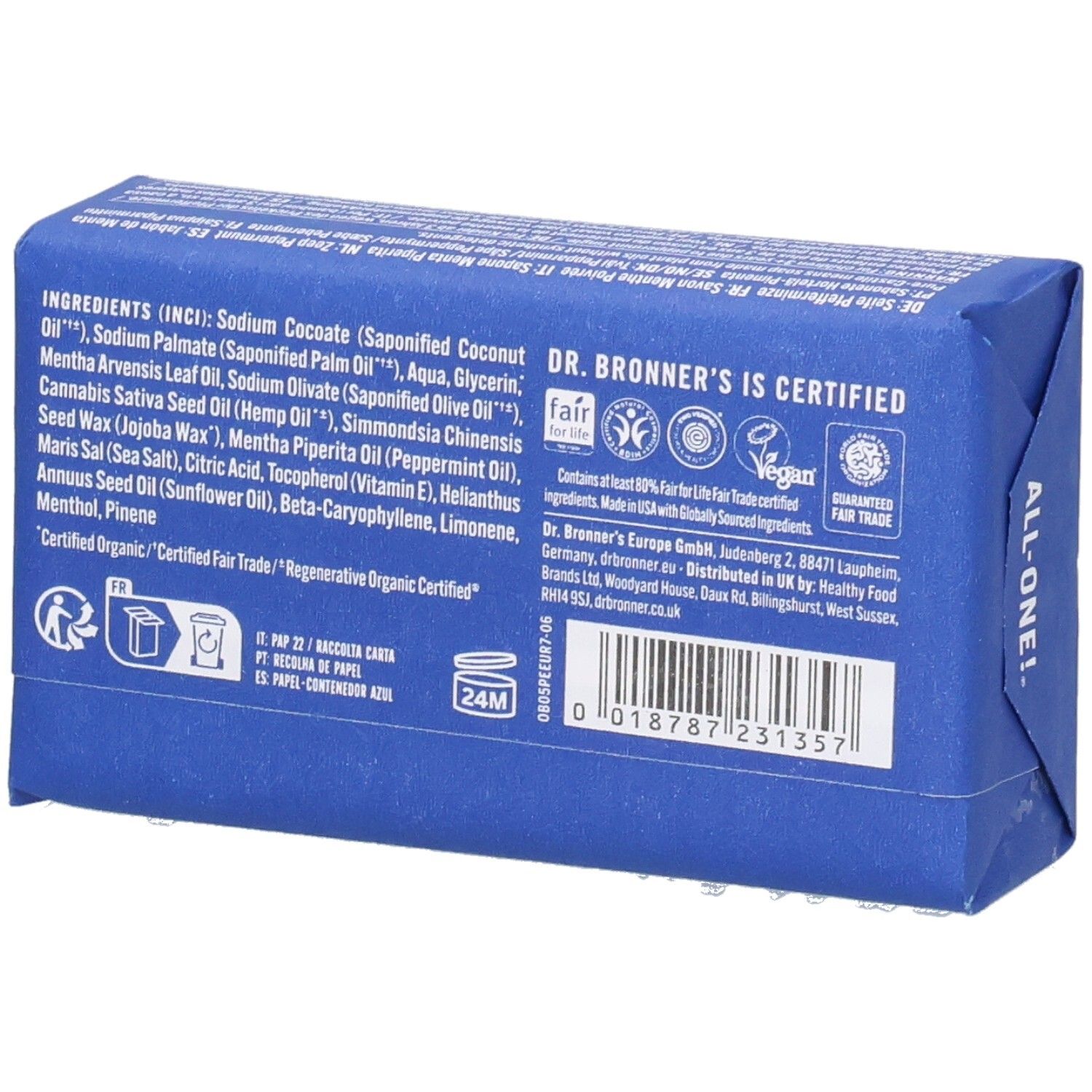 Dos du savon emballé bleu. Liste des ingrédients et certifications. Label Fair Trade et logo Vegan.