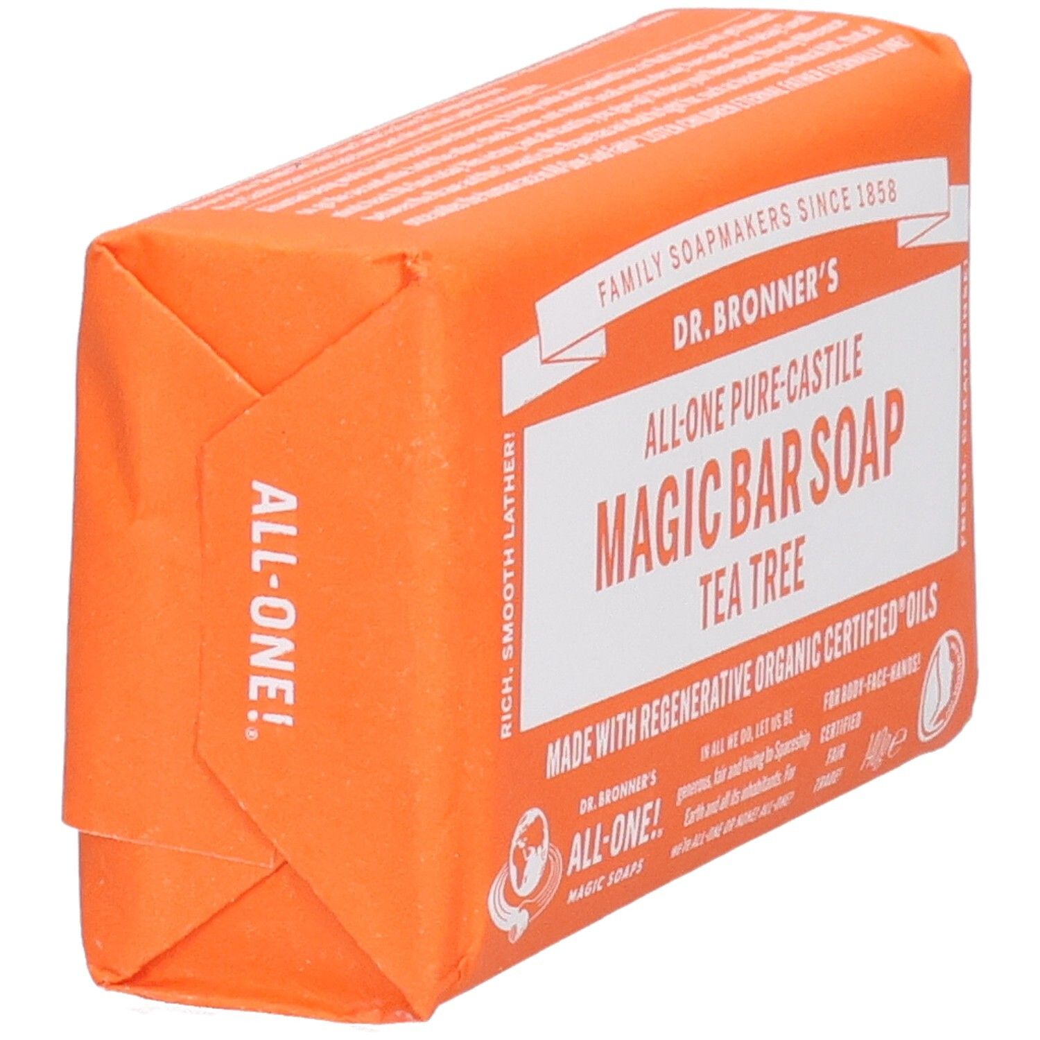 Savon orange emballé. Inscription: Magic Bar Soap Tea Tree. Vue de dessus.