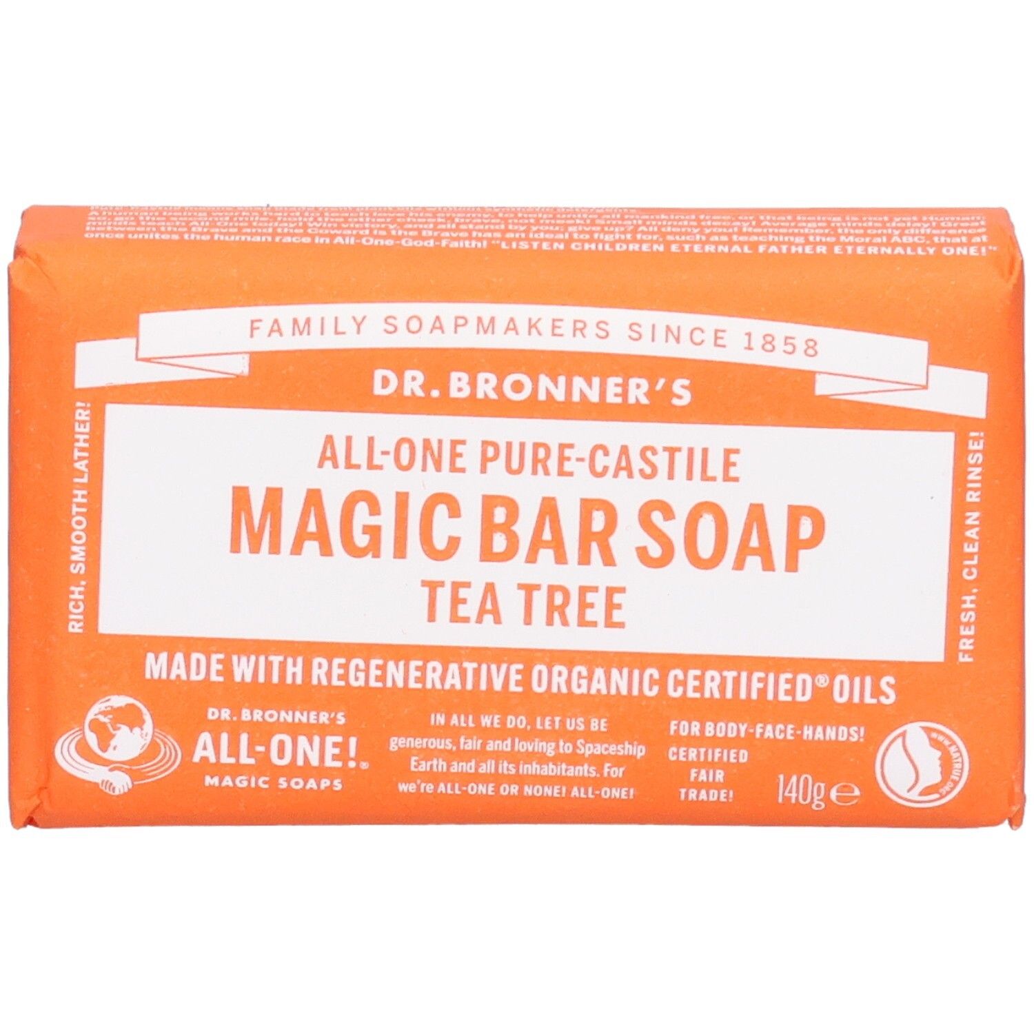 Savon orange emballé. Inscription: Magic Bar Soap Tea Tree. Label Fair Trade visible.