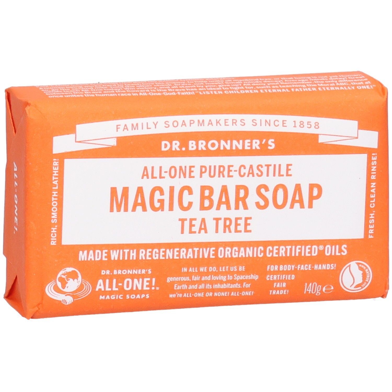 Savon orange emballé. Inscription: Magic Bar Soap Tea Tree. Label Fair Trade visible.