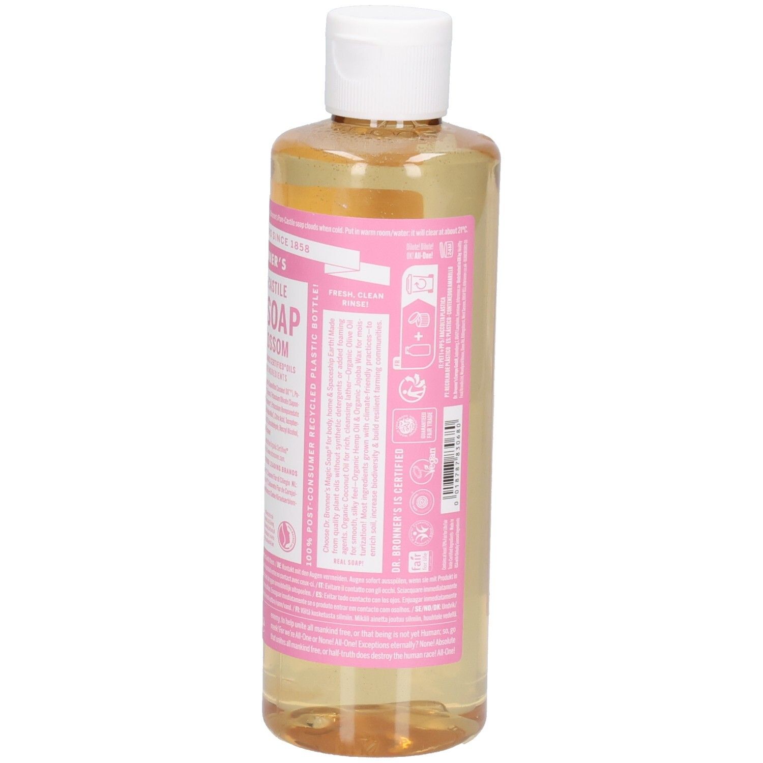 Vue arrière de la bouteille de savon liquide. Étiquette rose avec texte et logos. Bouchon blanc. Liquide clair visible.