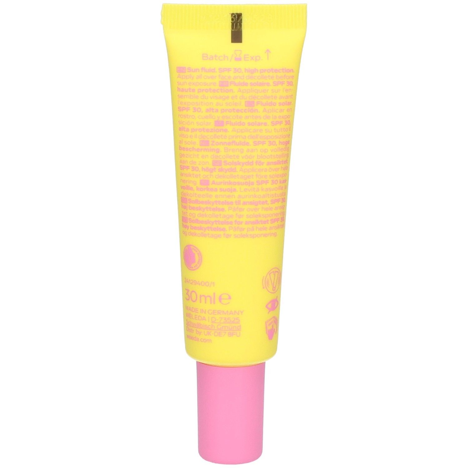 Dos du tube jaune avec bouchon rose. Texte multilingue. Inscription: 30ml.