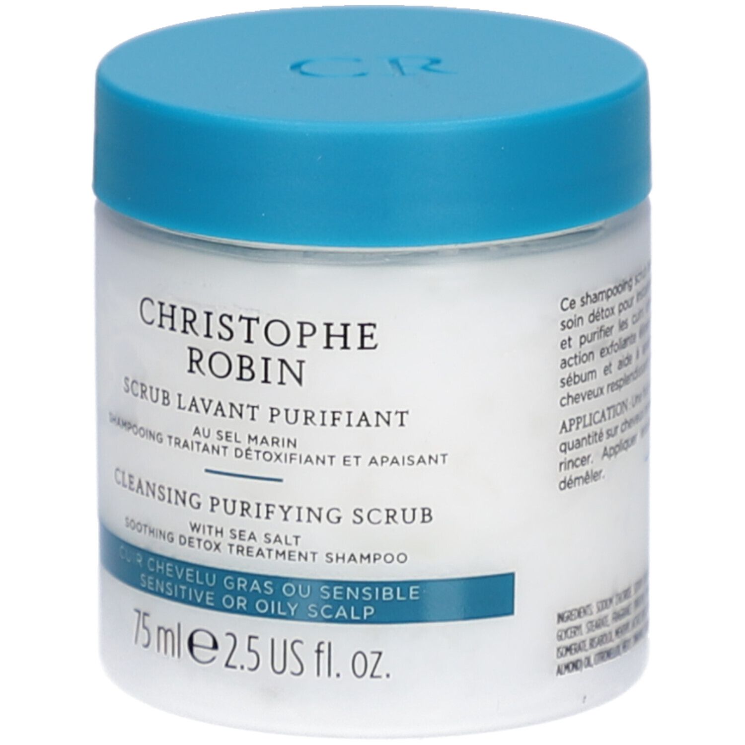Pot blanc avec couvercle bleu. Inscription: CHRISTOPHE ROBIN, SCRUB LAVANT PURIFIANT, CLEANSING PURIFYING SCRUB. Pour cuir chevelu gras ou sensible.