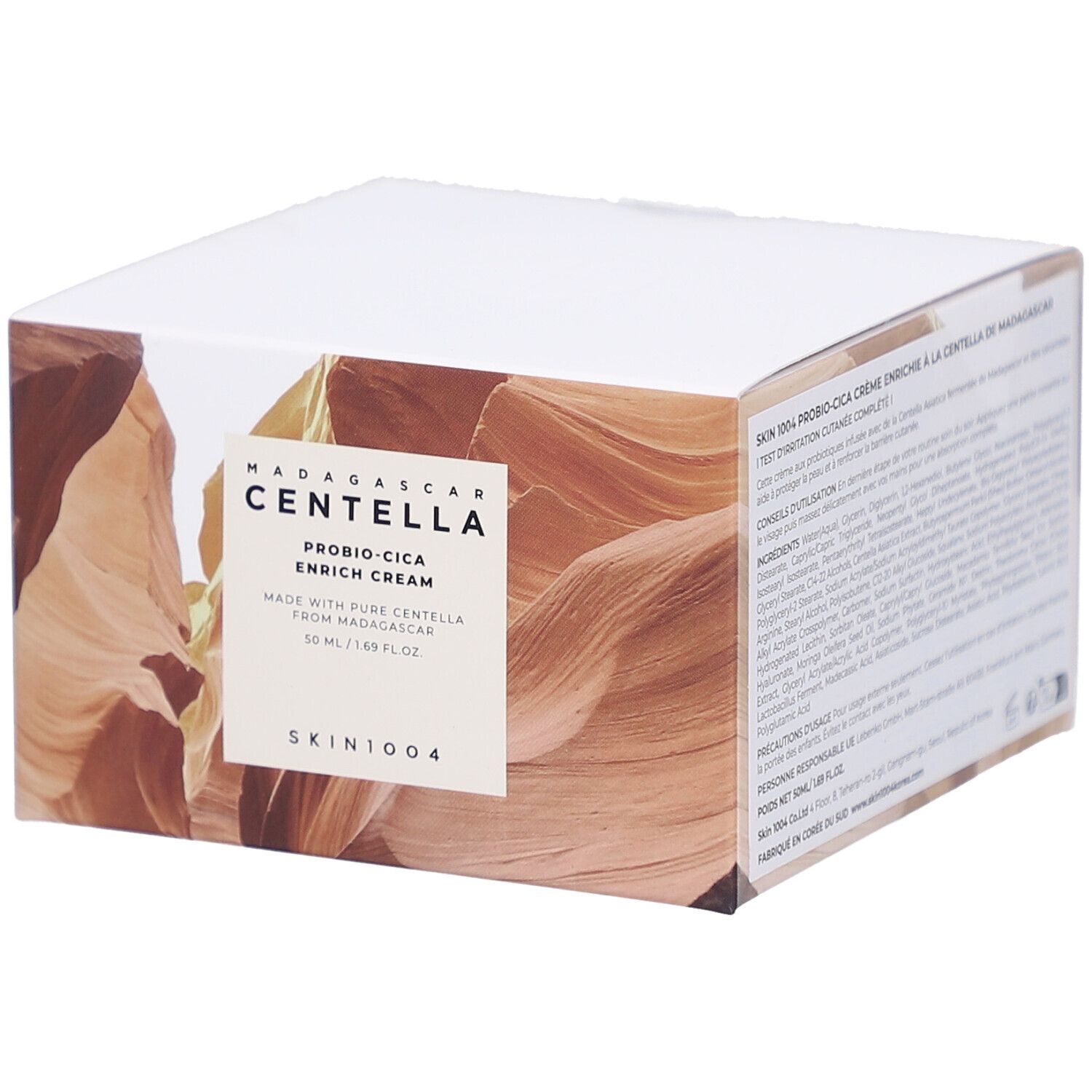 Boîte blanche avec informations produit. Texte: MADAGASCAR CENTELLA, PROBIO-CICA ENRICH CREAM, SKIN1004.