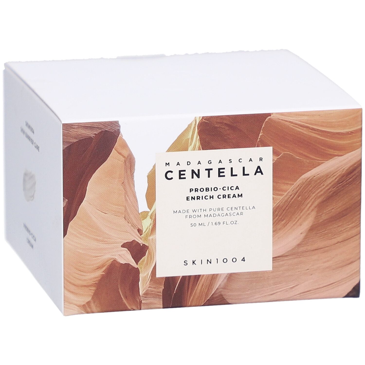 Boîte avec informations produit. Texte: MADAGASCAR CENTELLA, PROBIO-CICA ENRICH CREAM, SKIN1004.