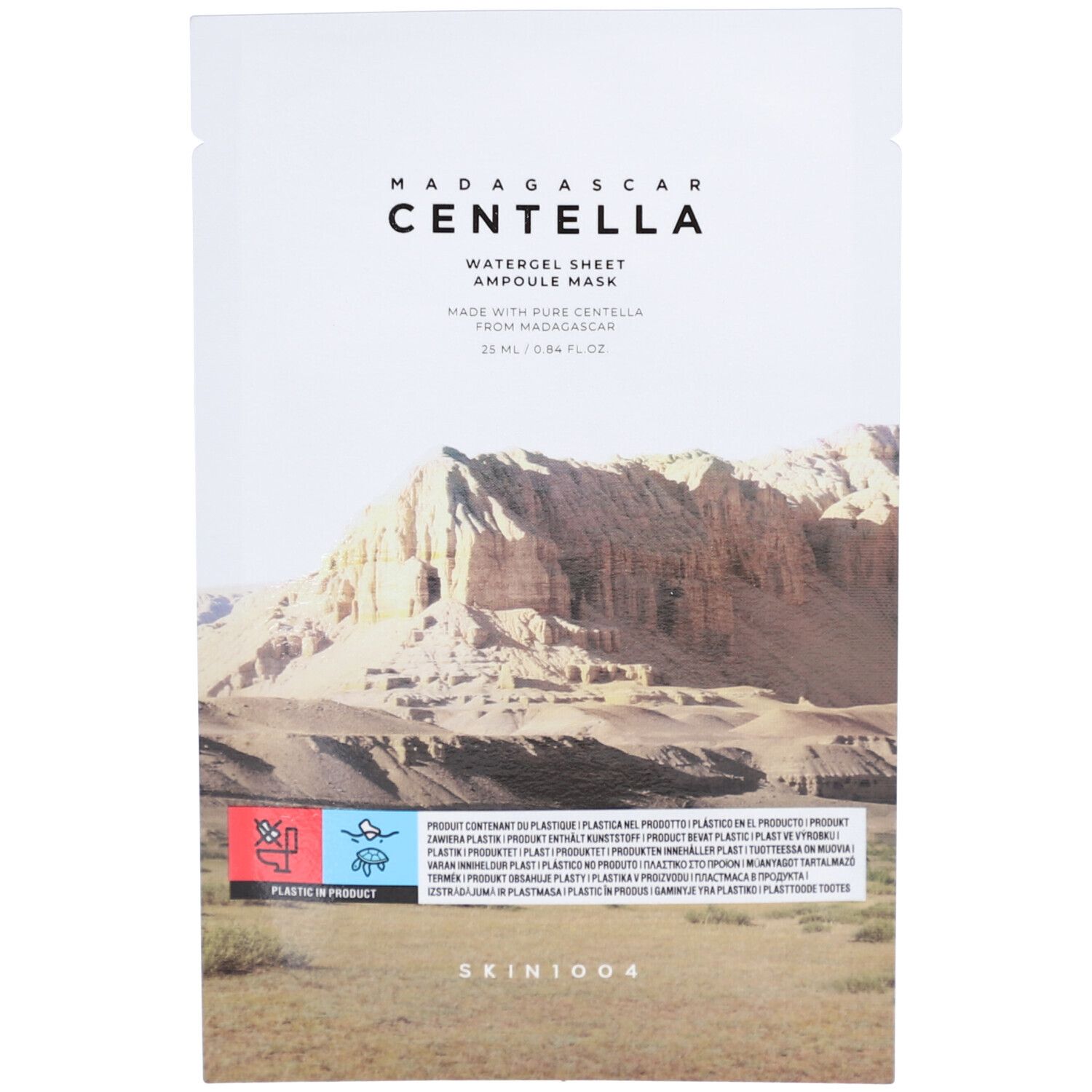 Emballage de masque facial. Face avant avec logo, nom du produit et paysage désertique. Marque SKIN1004.