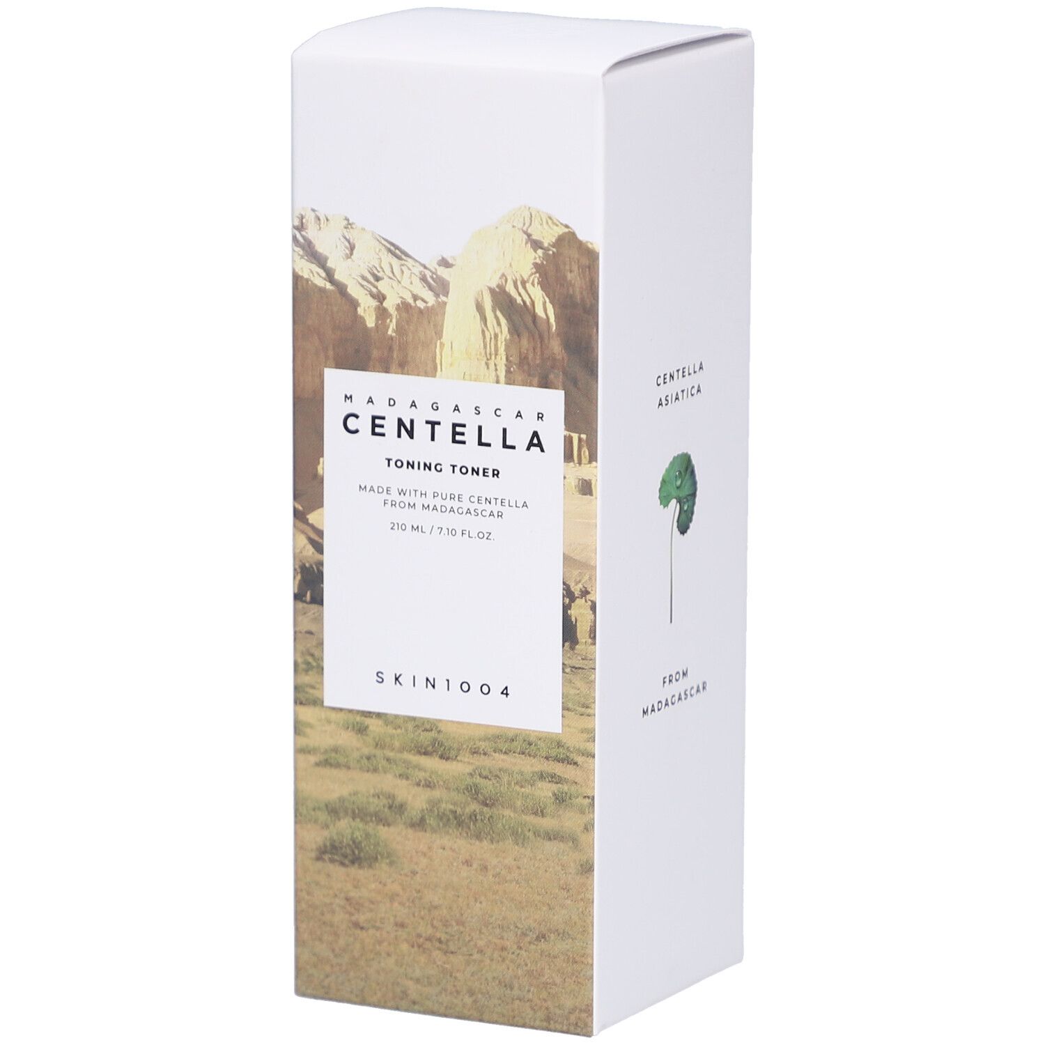Boîte blanche avec paysage. Texte: MADAGASCAR CENTELLA Toning Toner, SKIN1004. Inscription: 210 ml / 7.10 fl.oz.