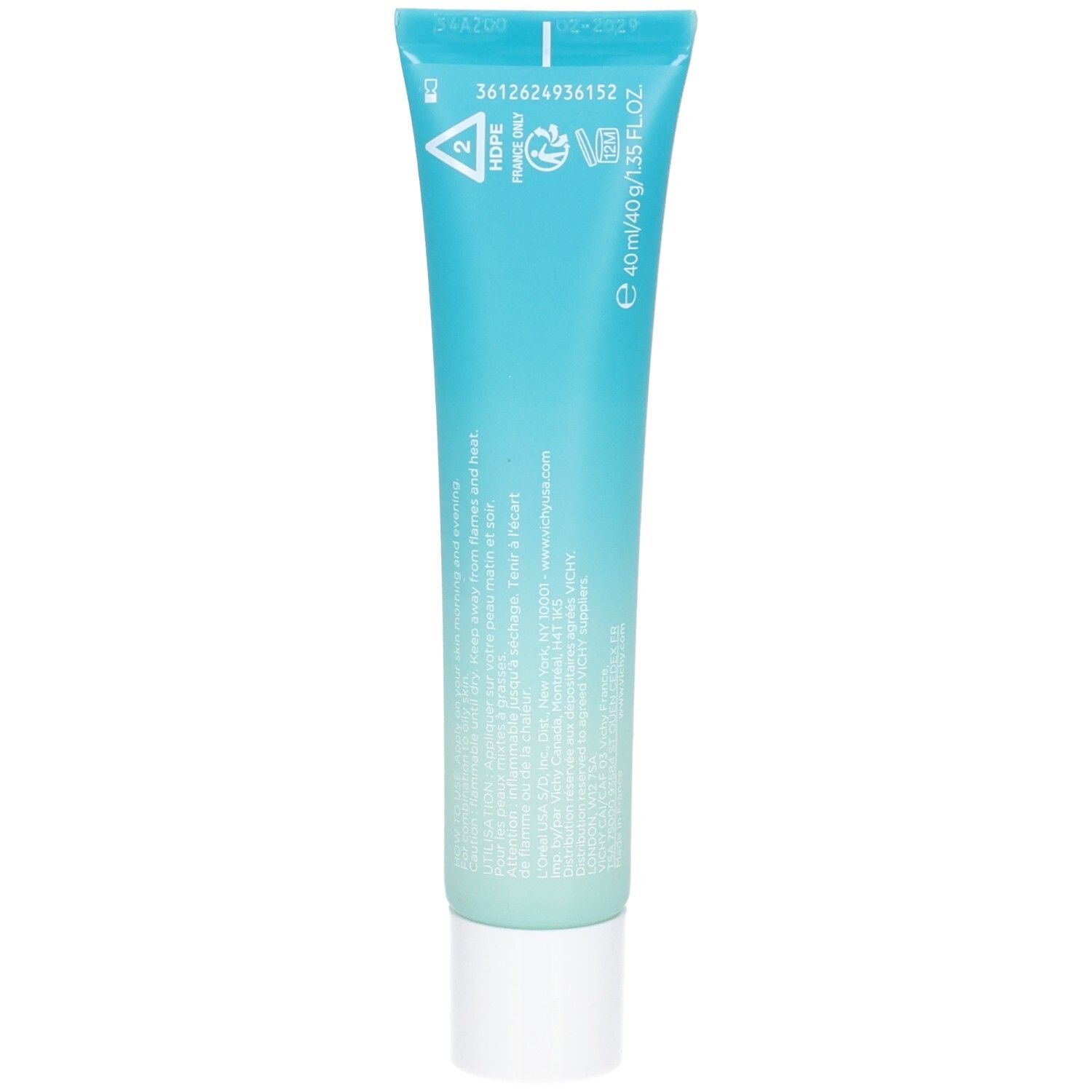 Dos du tube turquoise. Texte et symboles, dont code de recyclage, indication de volume et informations fabricant.
