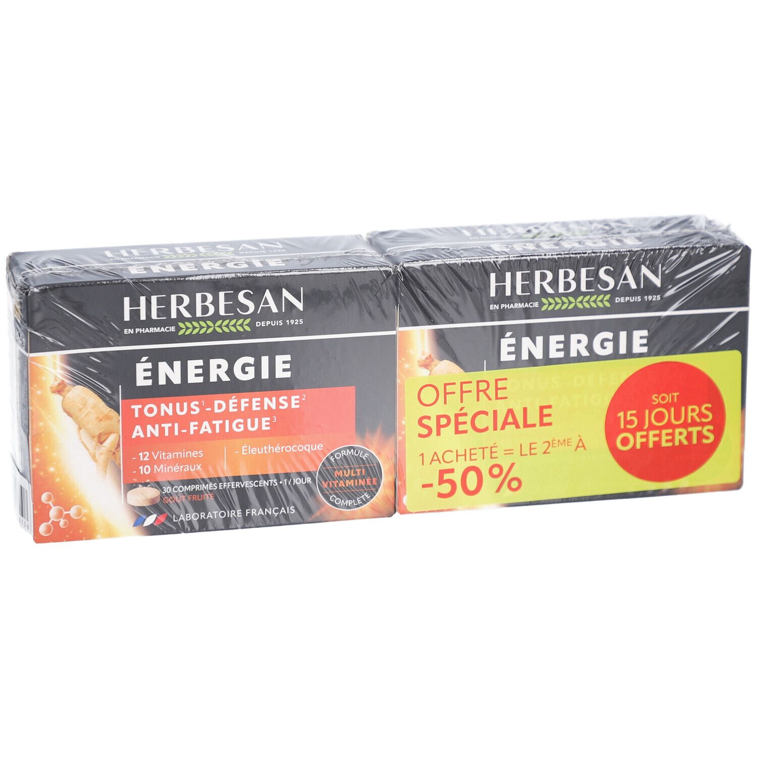 Deux boîtes HERBESAN ENERGIE. Emballage noir avec informations produit et promotions. Emballage plastique transparent.