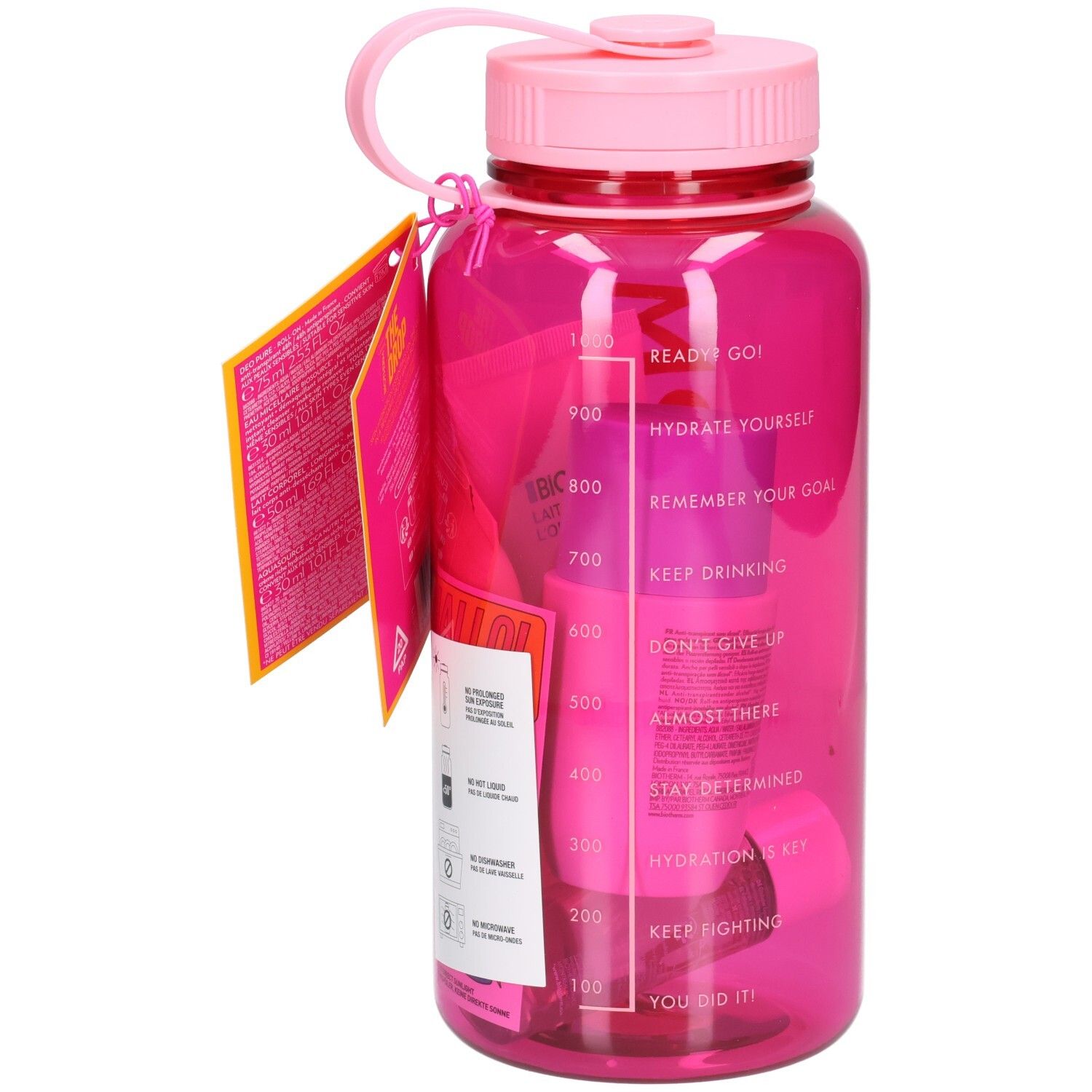 Gourde rose avec bouchon et anse roses. Contient des produits cosmétiques roses. Inscriptions avec mesures. Logo BIOTHERM.