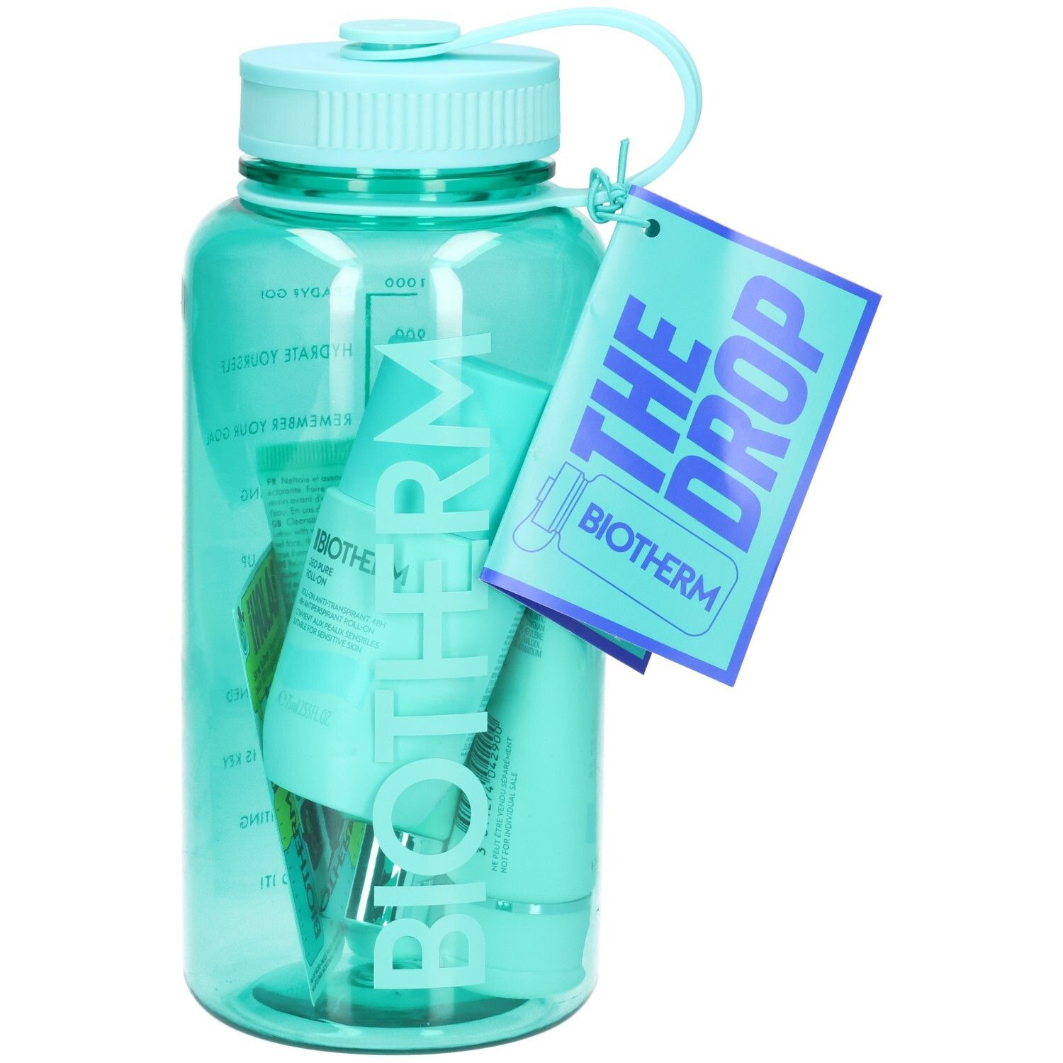 Bouteille d'eau turquoise avec bouchon et étiquette. Contient des tubes et des flacons. Étiquette avec "THE DROP" et logo BIOTHERM.