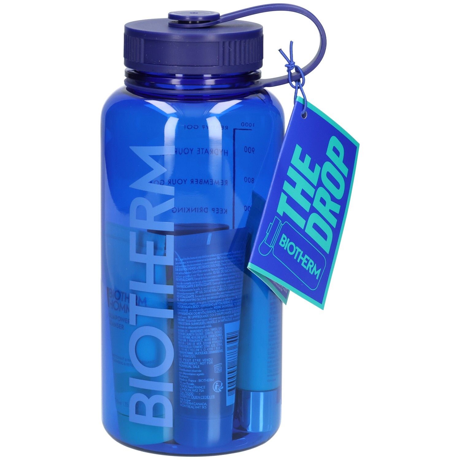 Gourde bleue avec produits. Étiquette avec texte: THE DROP et BIOTHERM. Contient produits bleus.