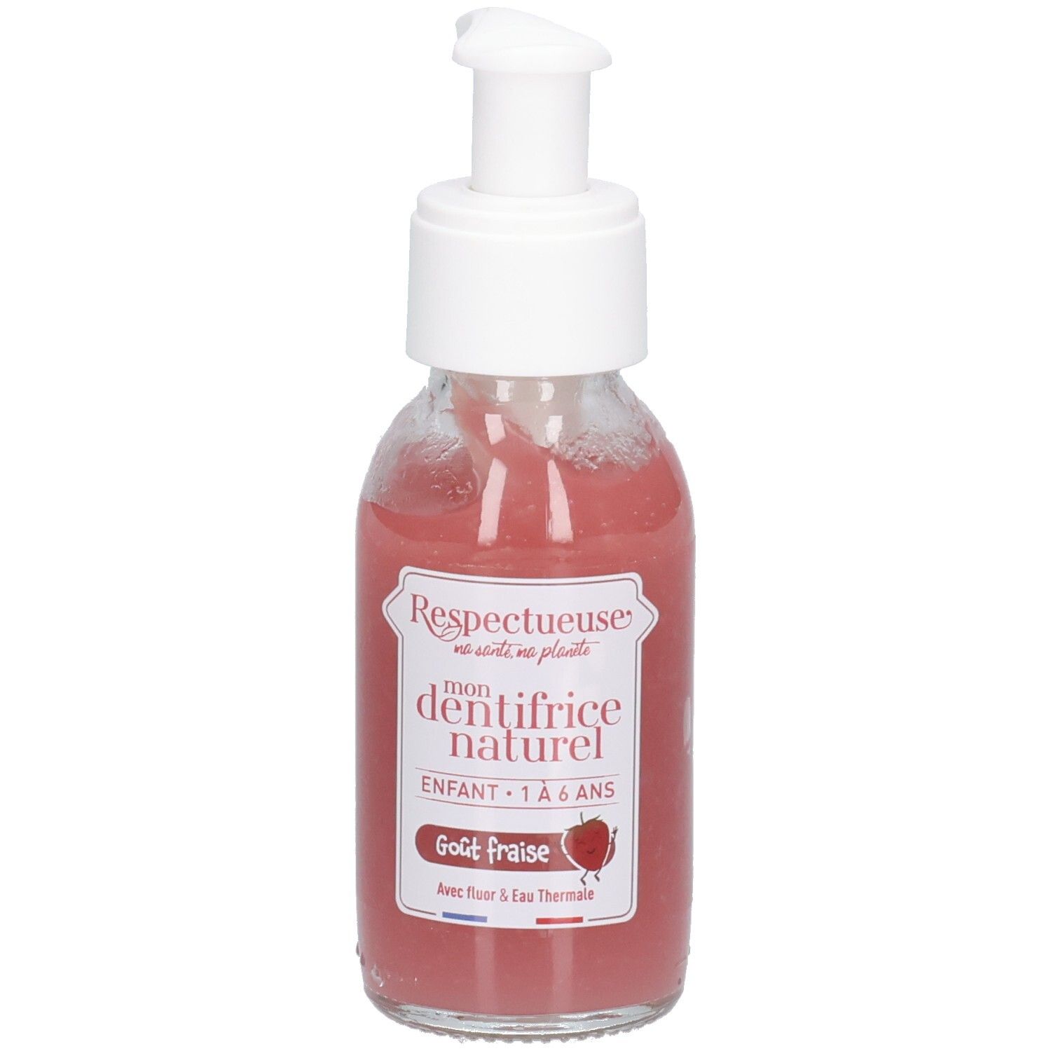 Flacon en verre avec pompe blanche, contenant un liquide rose. Étiquettes: "Respectueuse", "dentifrice naturel", "Goût fraise".