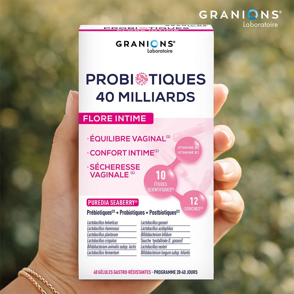 Main tenant une boîte de GRANIONS PROBIOTIQUES 40 MILLIARDS. Texte : FLORE INTIME, 12 souches, 10 études.