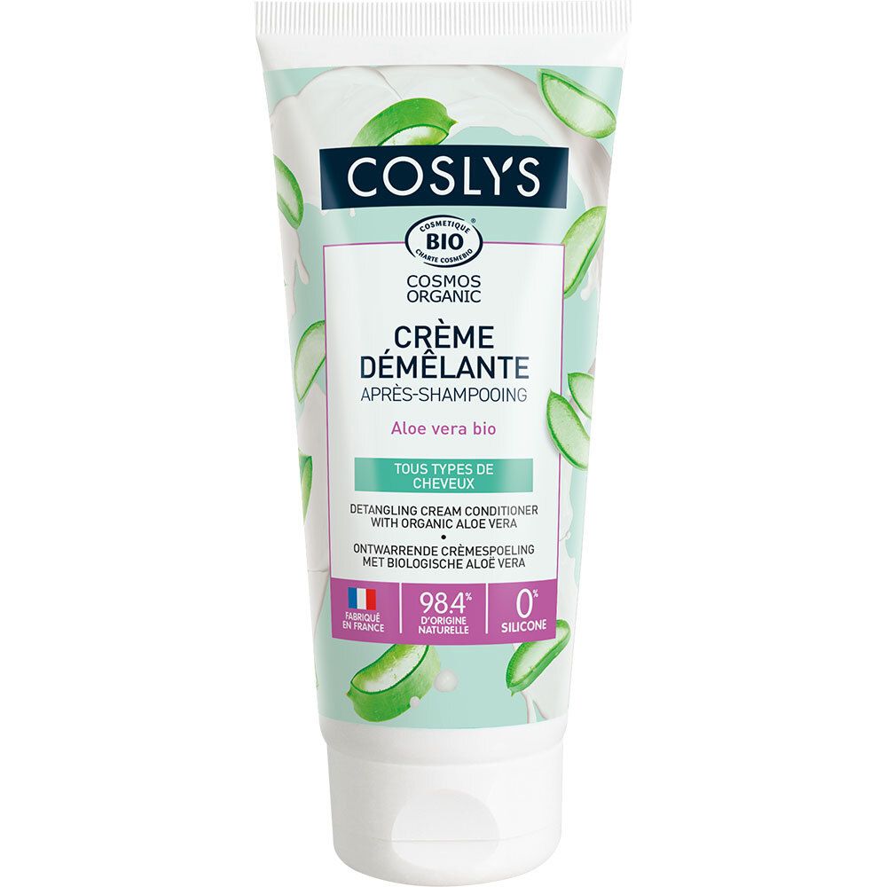 Tube de crème avec nom du produit et illustrations d'aloe vera. Texte : Crème démêlante, Cosmos Organic, 98,4% d'origine naturelle, 0% silicone.
