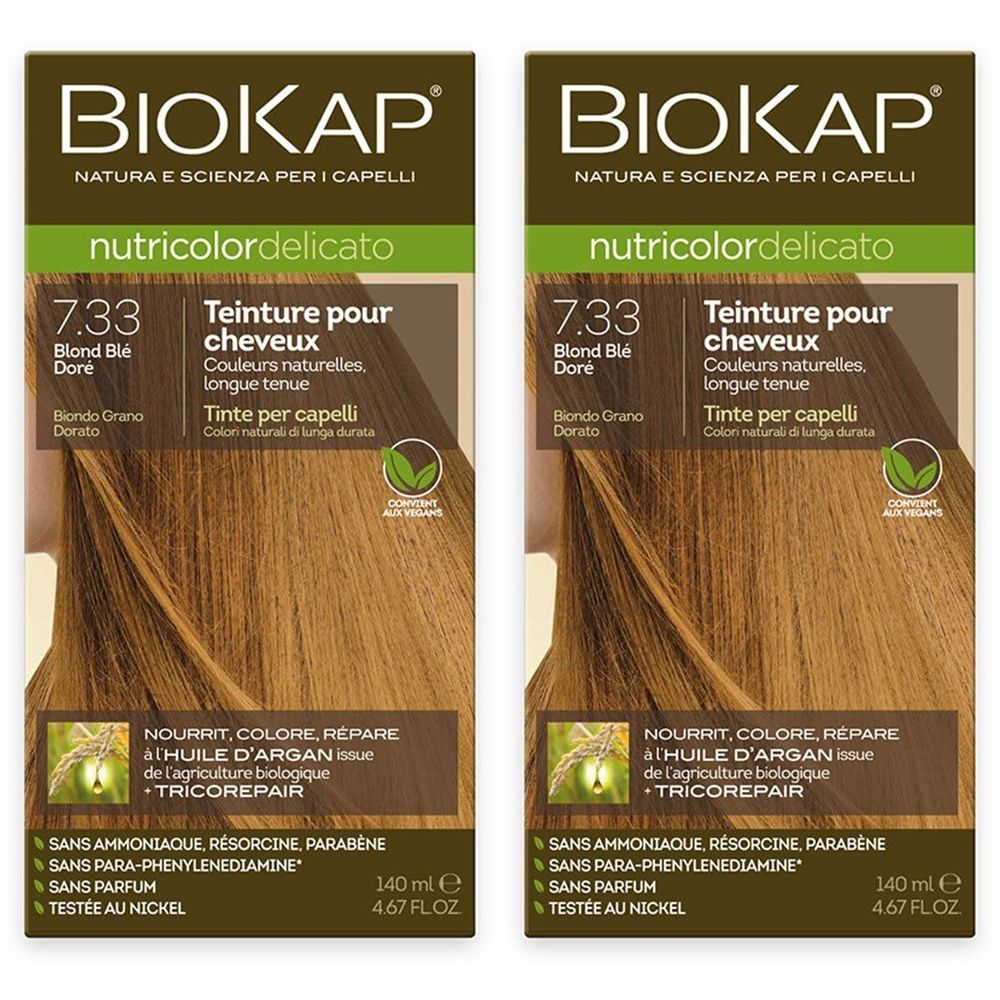 Deux boîtes de teinture capillaire. Inscription: BIOKAP, nutricolordelicato, 7.33 Blond Blé Doré. Contient de l'huile d'argan. 140 ml.