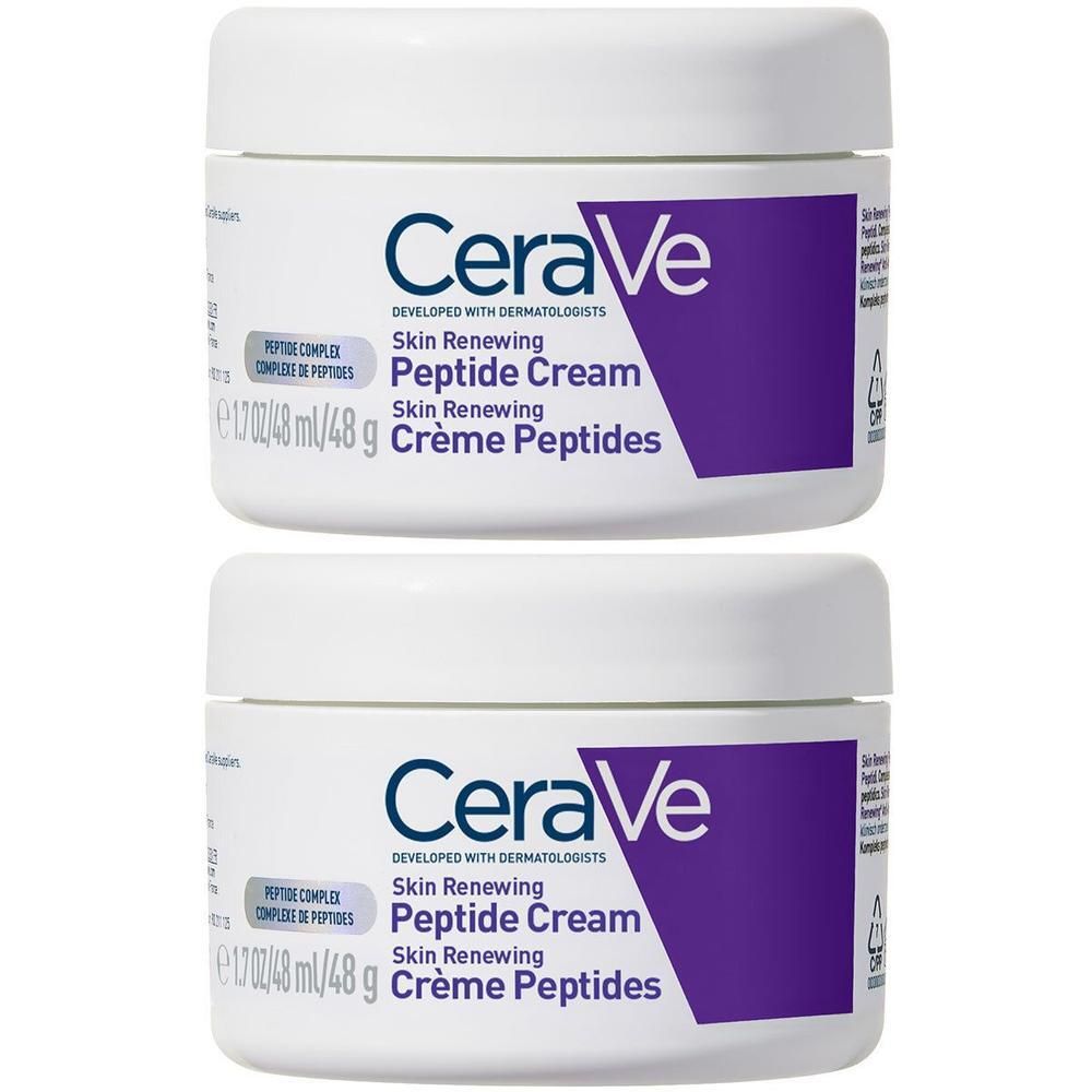 Deux pots blancs avec des accents violets. Inscription : CeraVe Skin Renewing Peptide Cream.