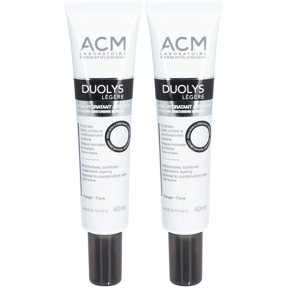 Deux tubes de crème. Inscription: ACM, DUOLYS LEGERE, SOIN HYDRATANT. Bouchon noir, tube blanc avec texte.