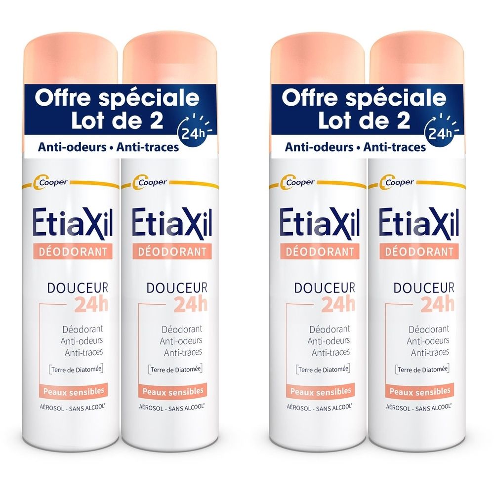 Quatre aérosols de déodorant. Boîtes blanches, couvercles roses. Texte bleu : "Offre spéciale Lot de 2". Inscription : Etiaxil, Déodorant, Douceur 24h.