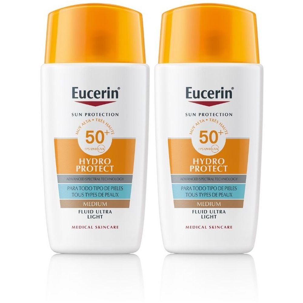 Deux flacons blancs avec bouchons orange. Inscription: Eucerin Sun Protection 50+ Hydro Protect. Pour tous types de peaux. Medium Fluid Ultra Light.